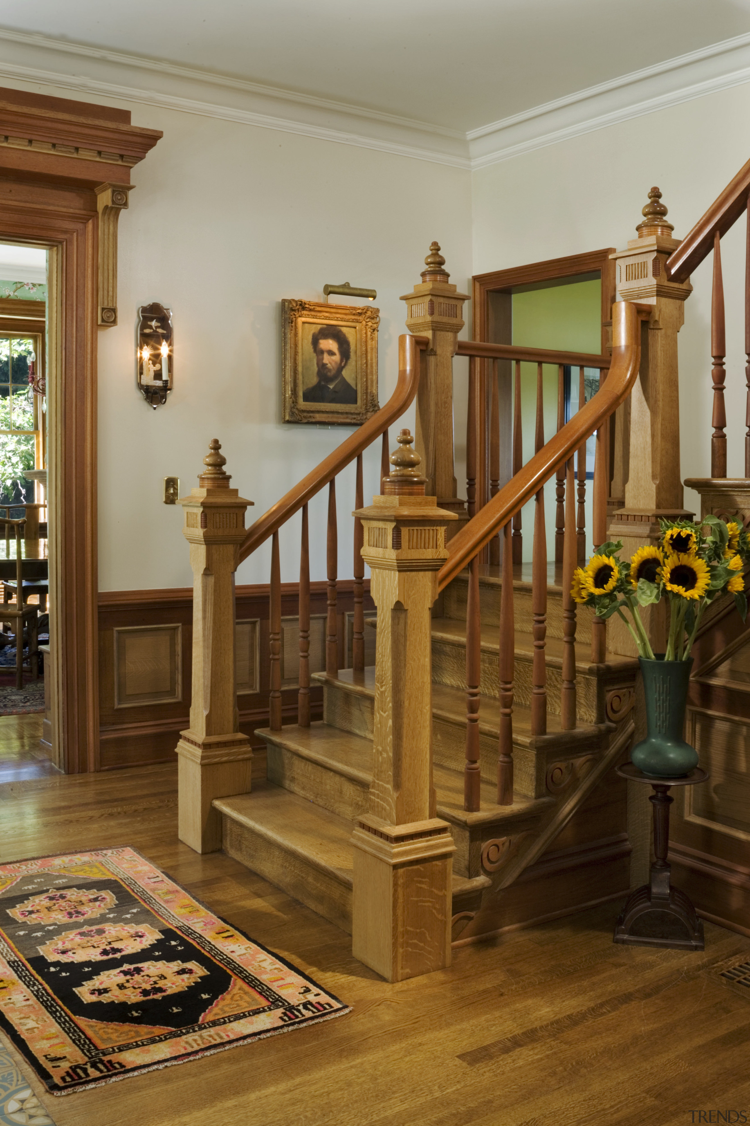 A view of the wooden staircase, wooden flooring, baluster, estate, floor, flooring, furniture, handrail, hardwood, home, interior design, living room, molding, stairs, wall, wood, wood flooring, brown
