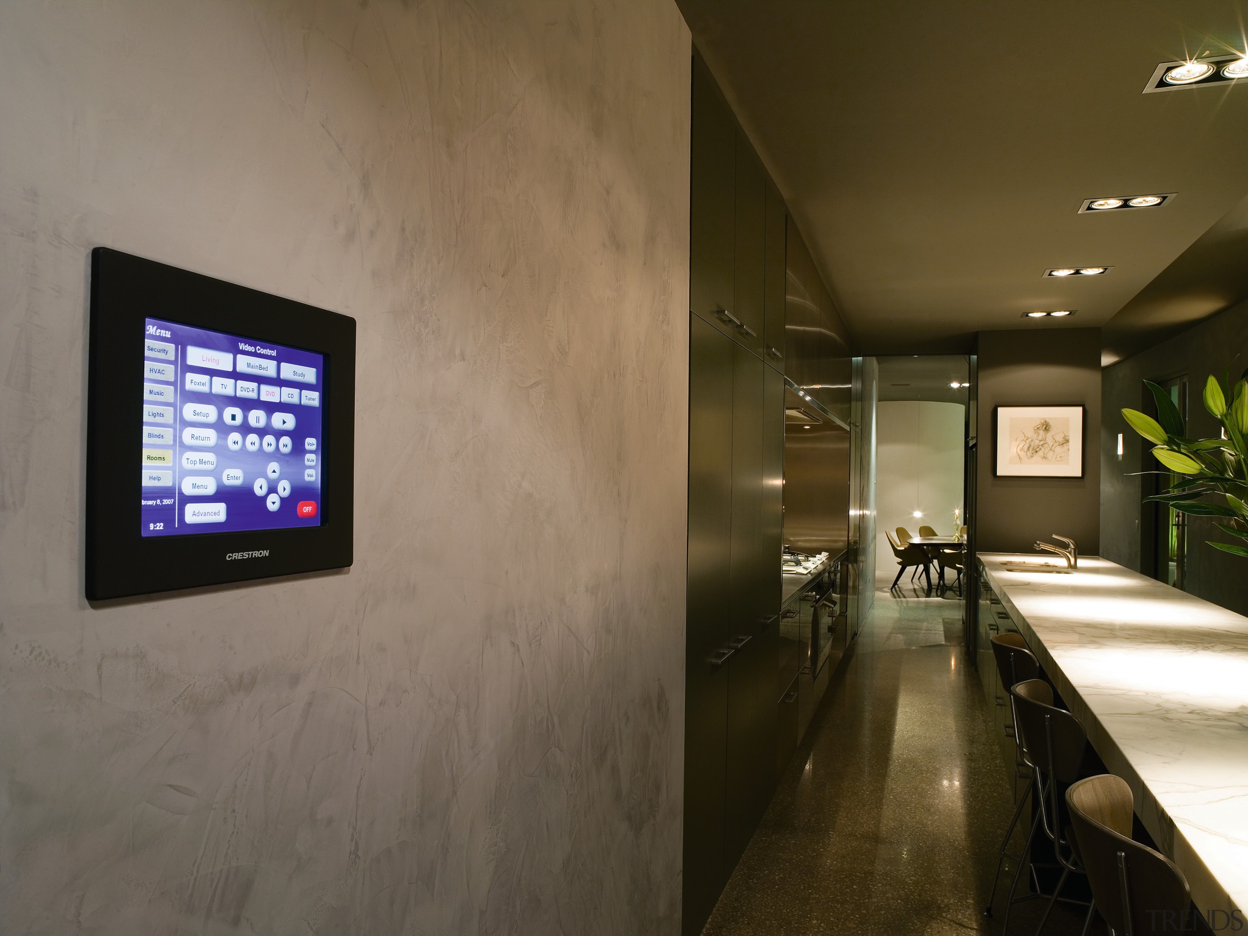 A view of a touch screen, grey walls. ceiling, interior design, brown, gray