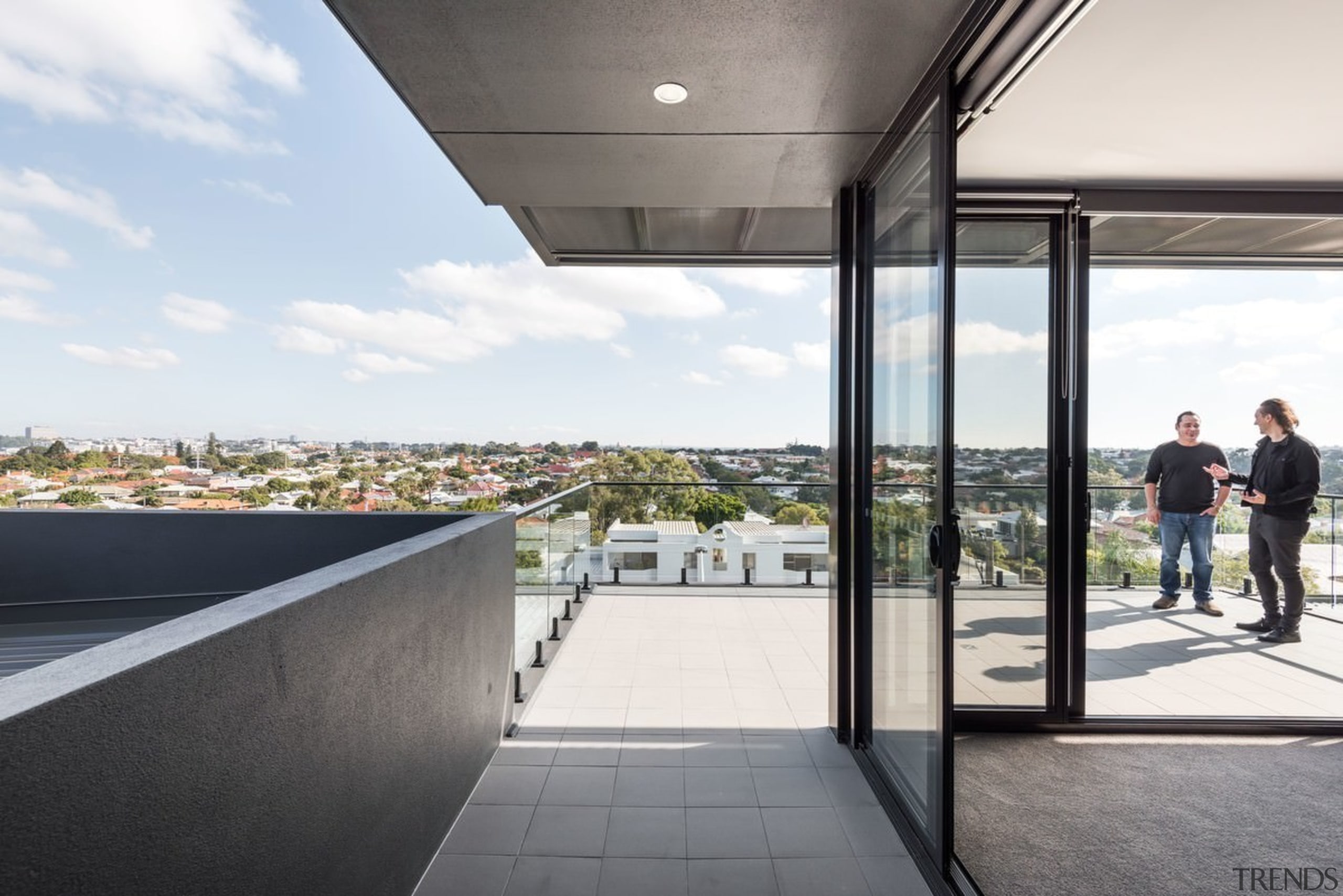 This terrace wraps around the upper level of architecture, building, condominium, daylighting, house, real estate, window, white, gray