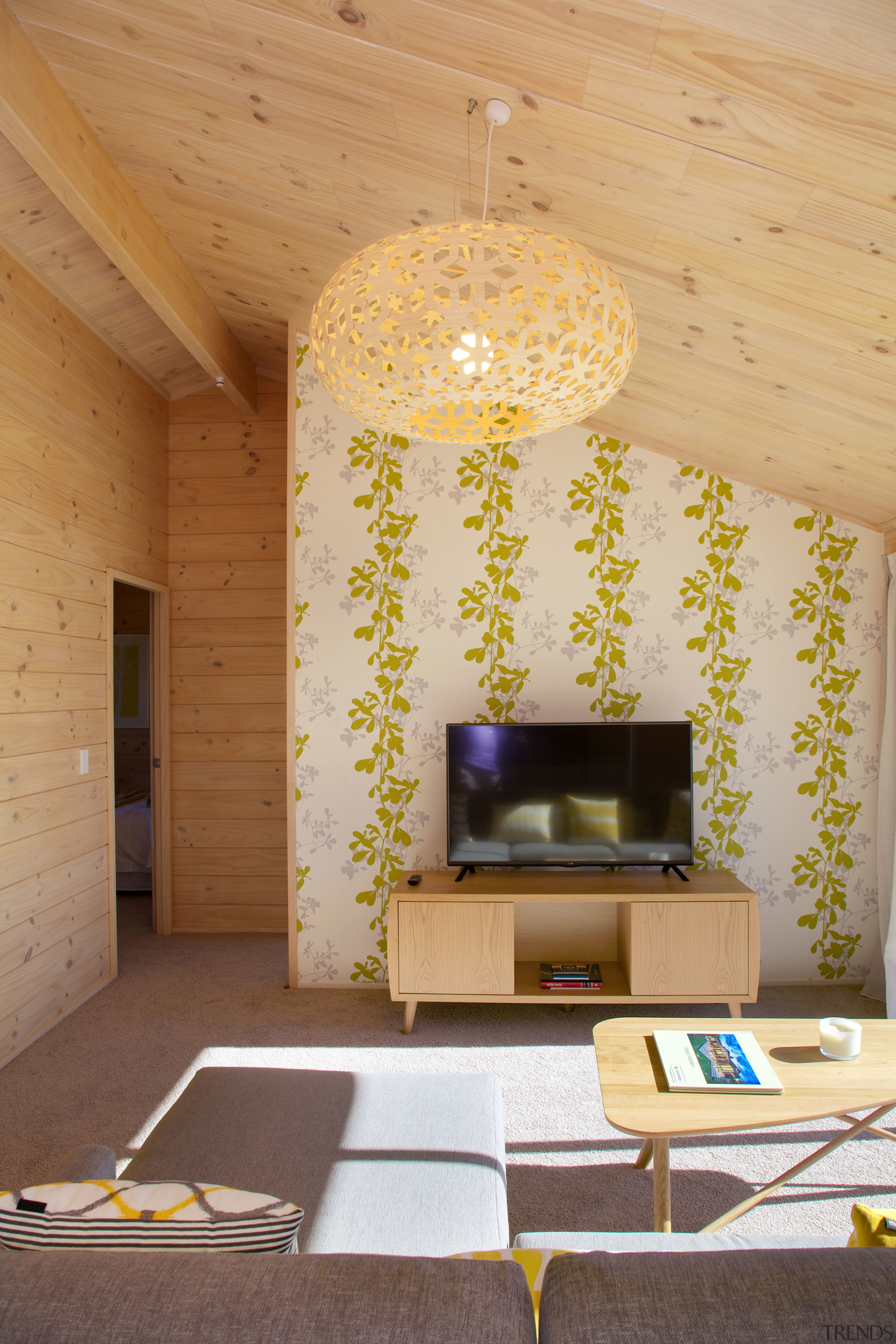 The new Lockwood show home features a decorative architecture, ceiling, house, interior design, living room, room, table, wall, orange, brown