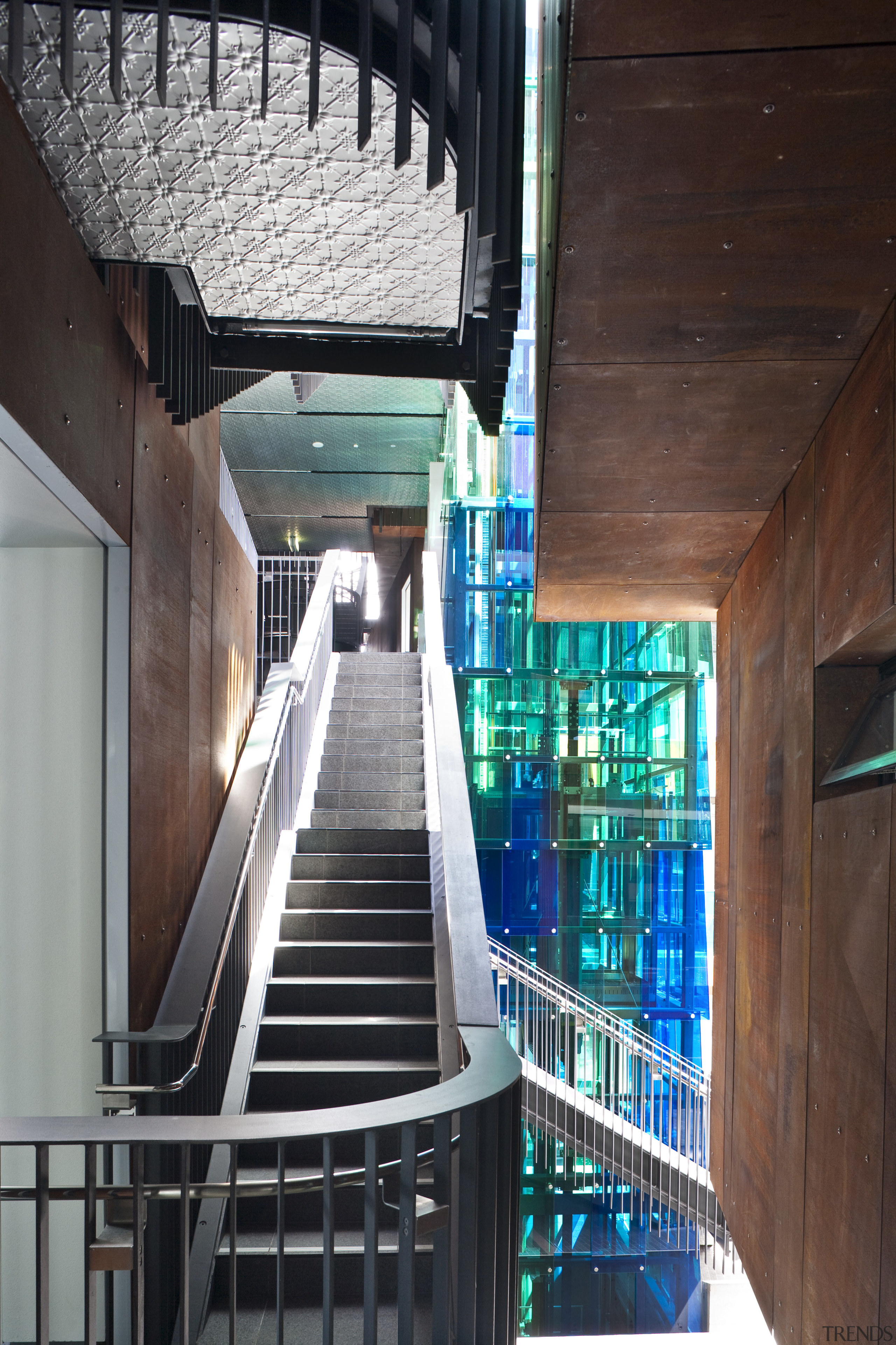 Interior view of the Ironbank building which features architecture, building, daylighting, glass, stairs, structure, tourist attraction, red