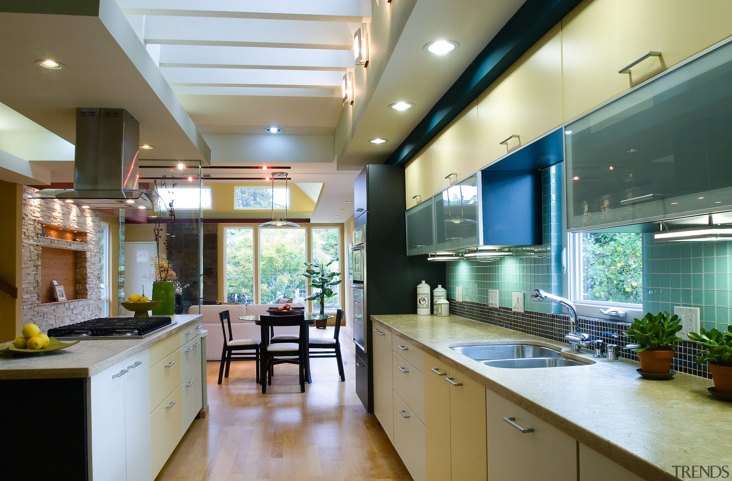 A view of this modern kitchen designed by ceiling, countertop, interior design, kitchen, real estate