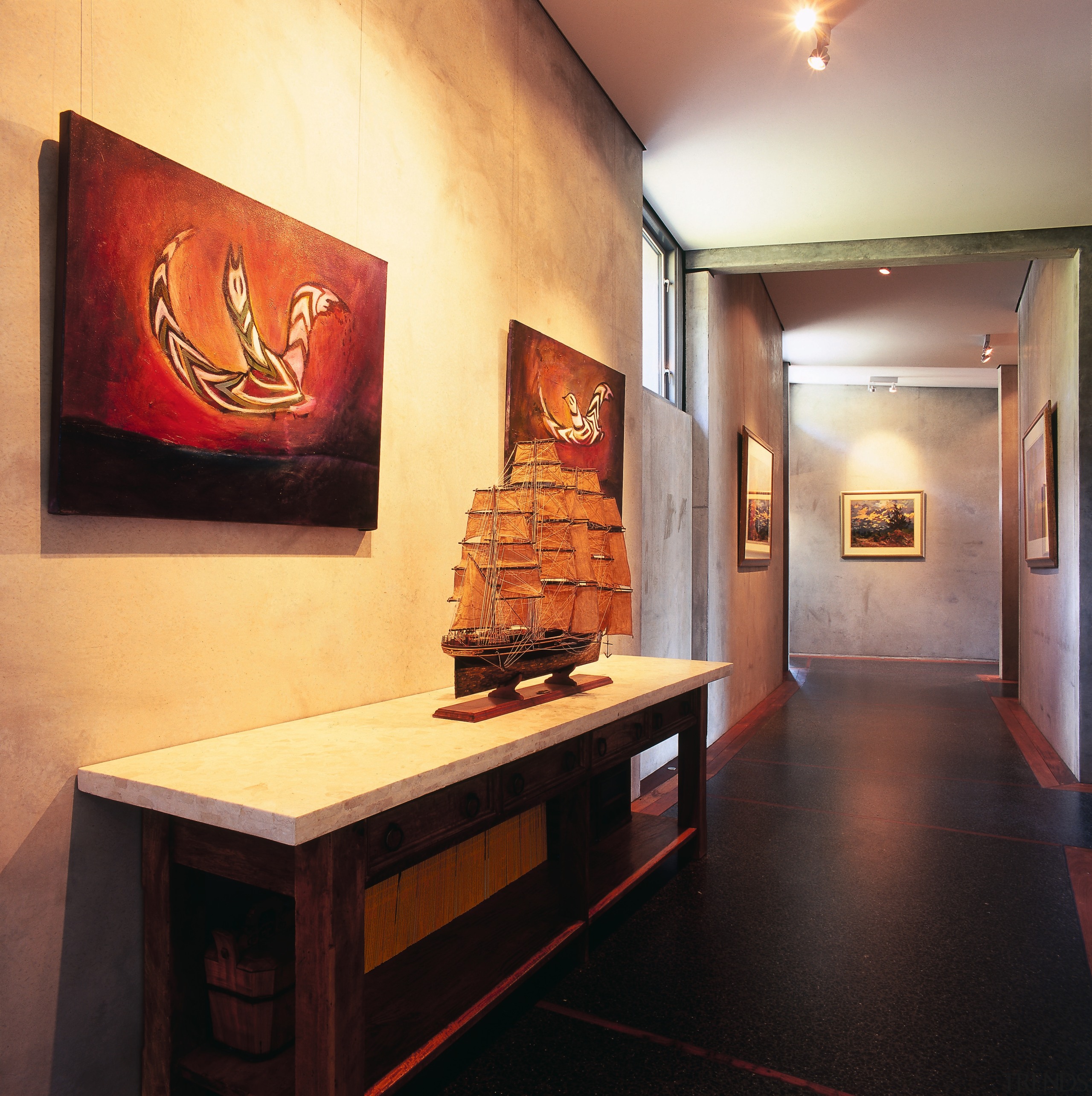 view of the extra wide hallways featuring stained exhibition, interior design, orange, black