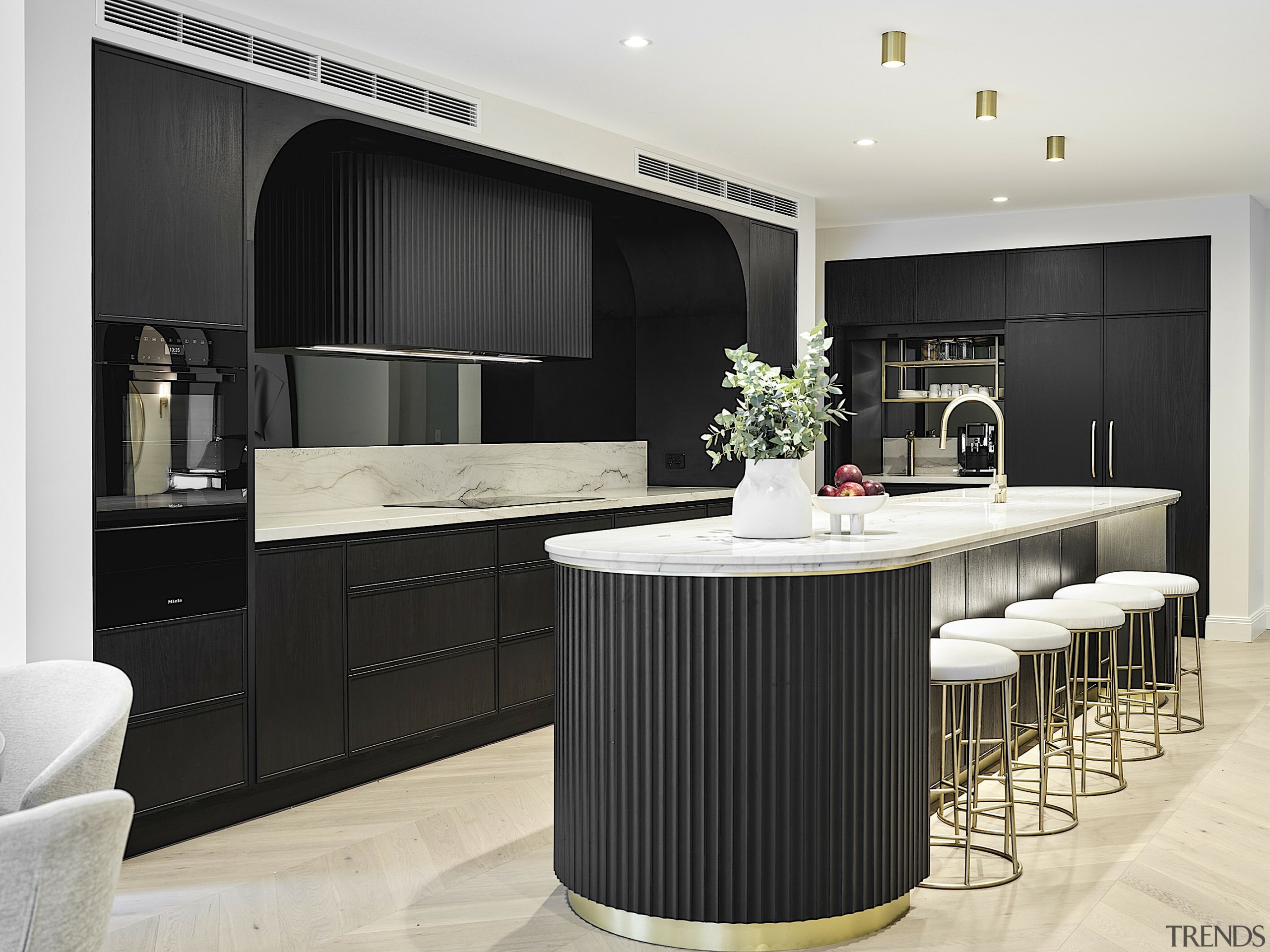 The black crenulated island detail is repeated on 