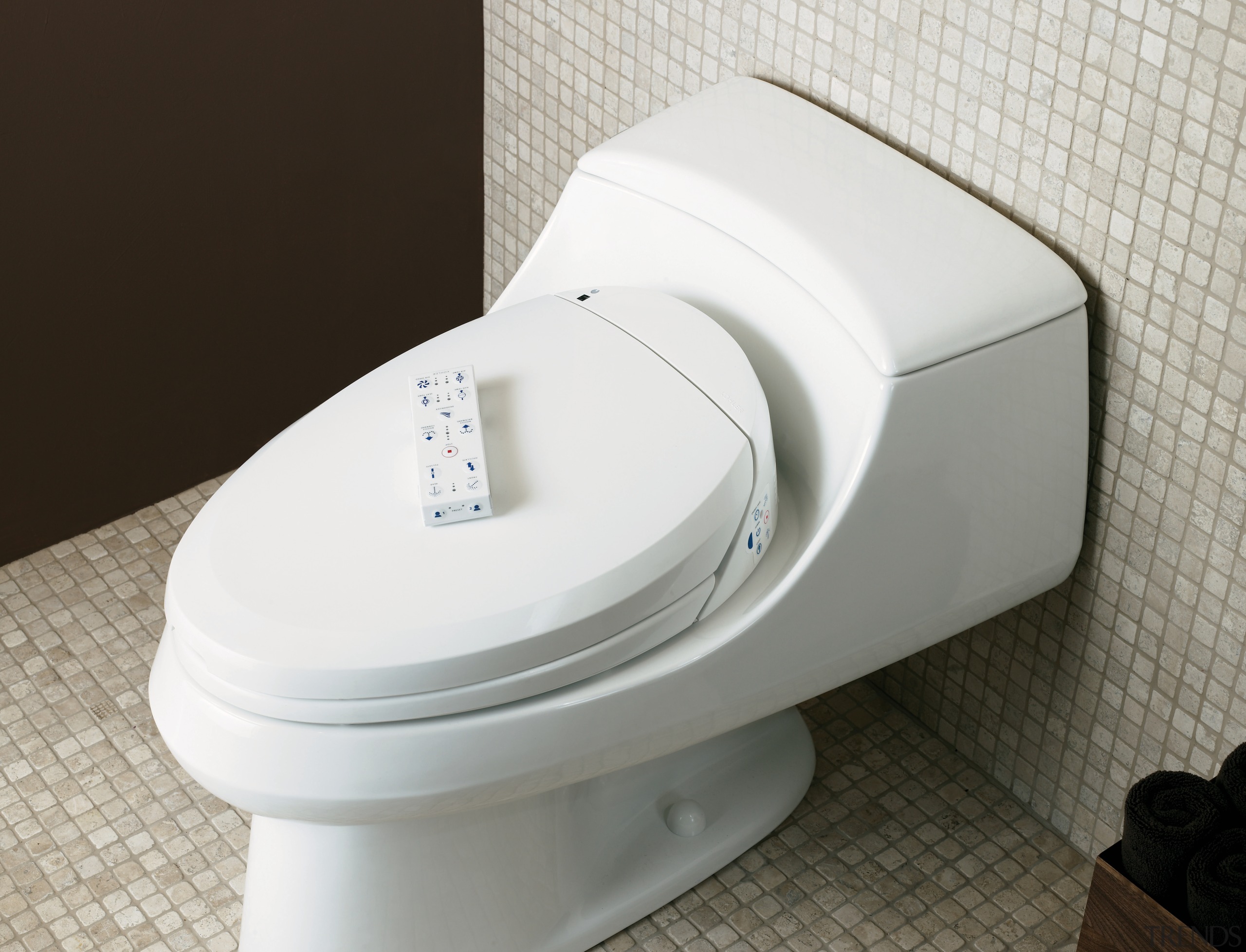 The Kohler C toliet seat offers a choice bidet, hardware, plumbing fixture, product, product design, toilet, toilet seat, white, black, gray