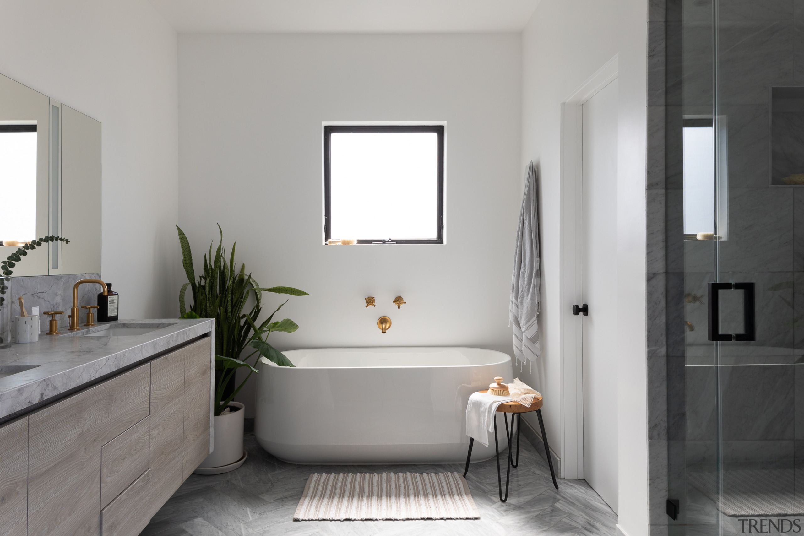 The plumbing fixtures float against the simple white 