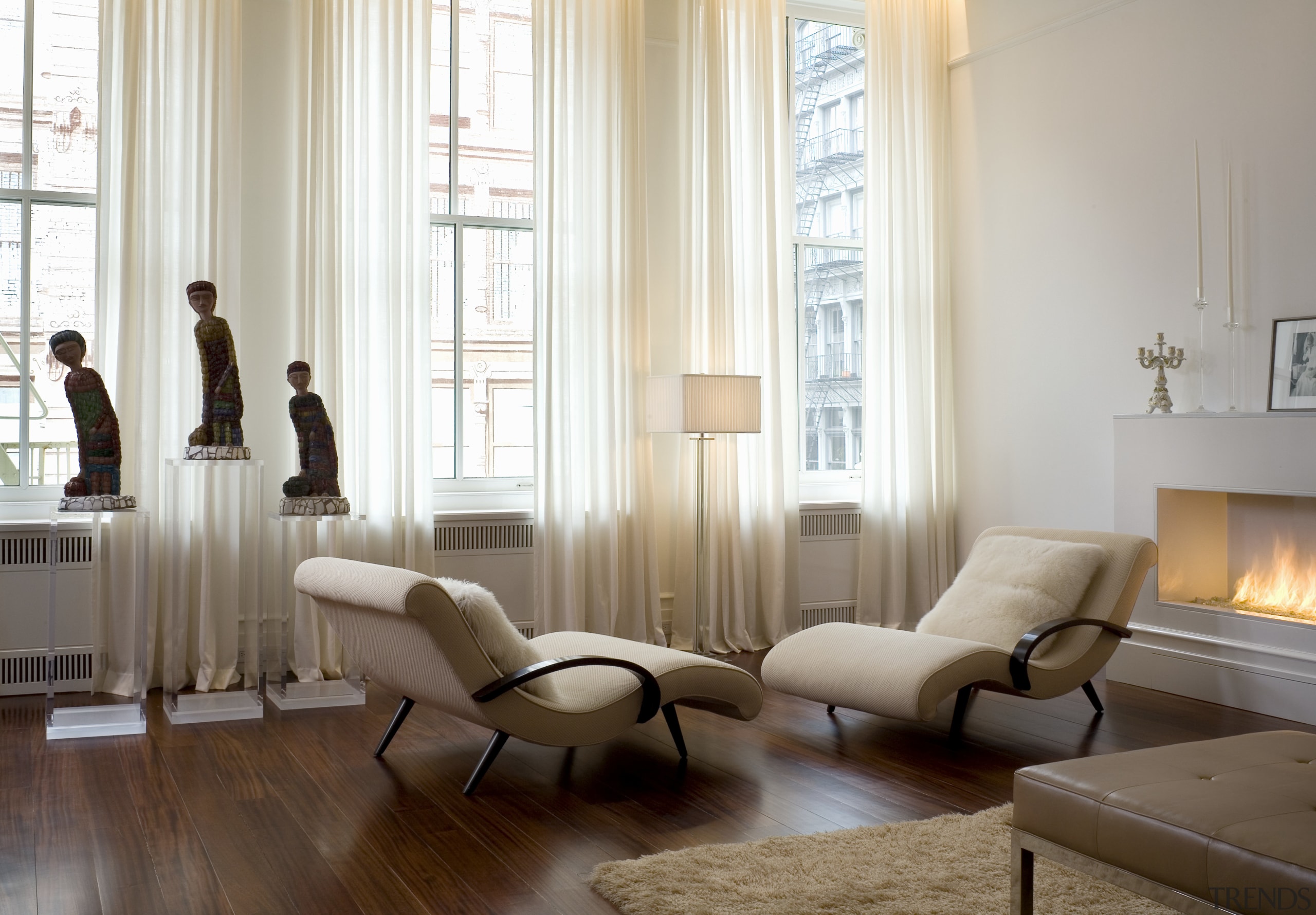 View of living room featuring floor length sheer chair, couch, curtain, floor, flooring, furniture, hardwood, home, interior design, living room, room, table, window, window covering, window treatment, wood, white