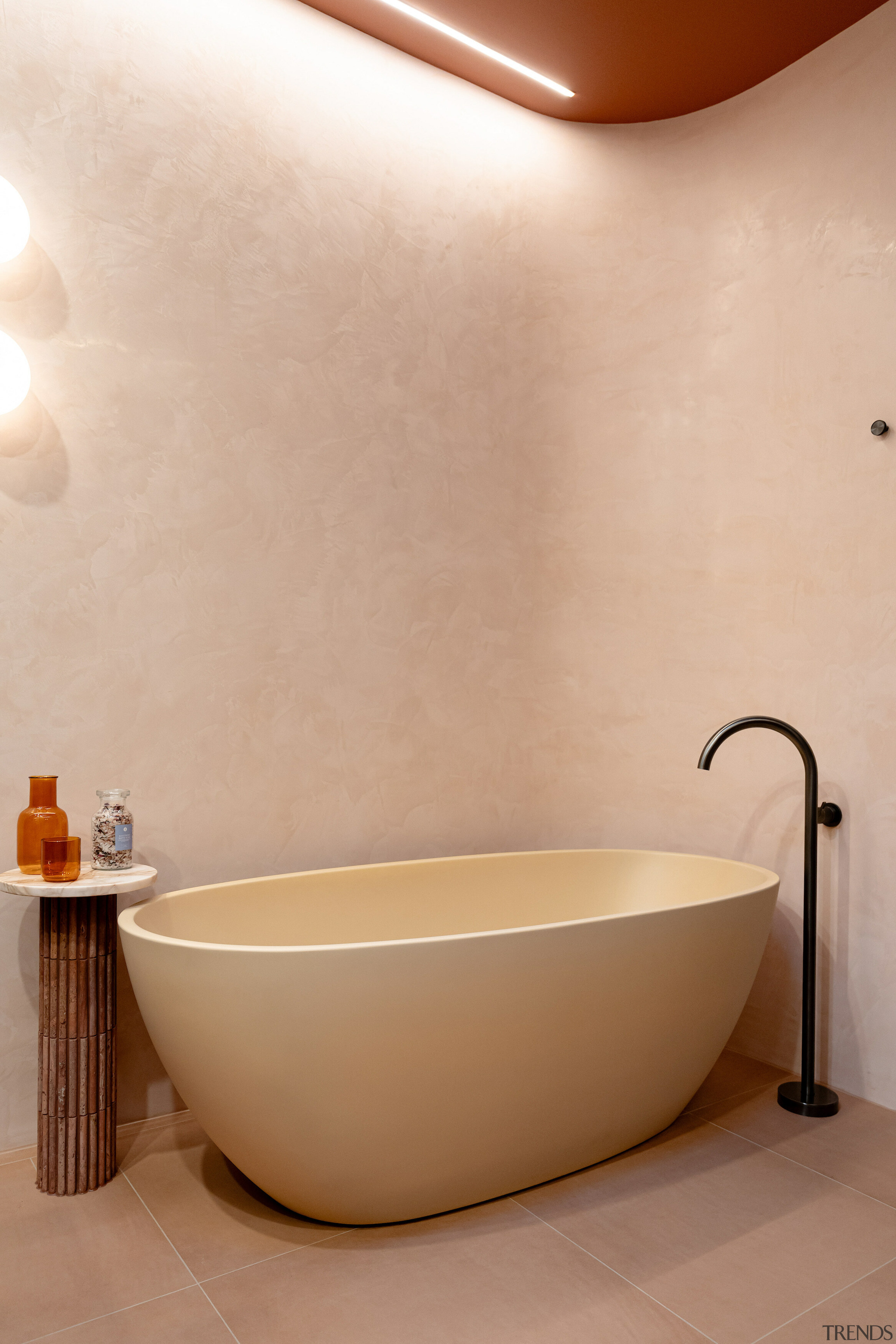 The bath tones in with the bathroom's hero 