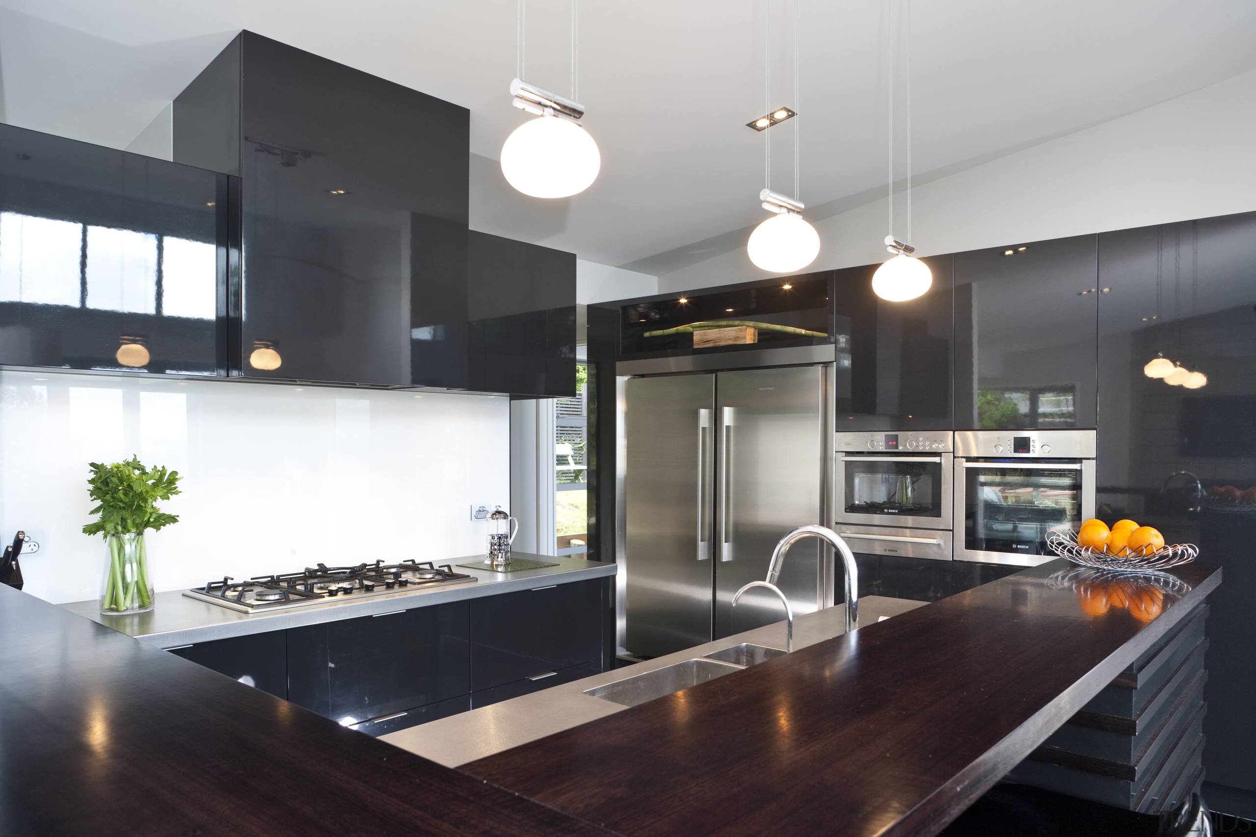 View of kitchen designed by Celia Visser of countertop, interior design, kitchen, real estate, black, white