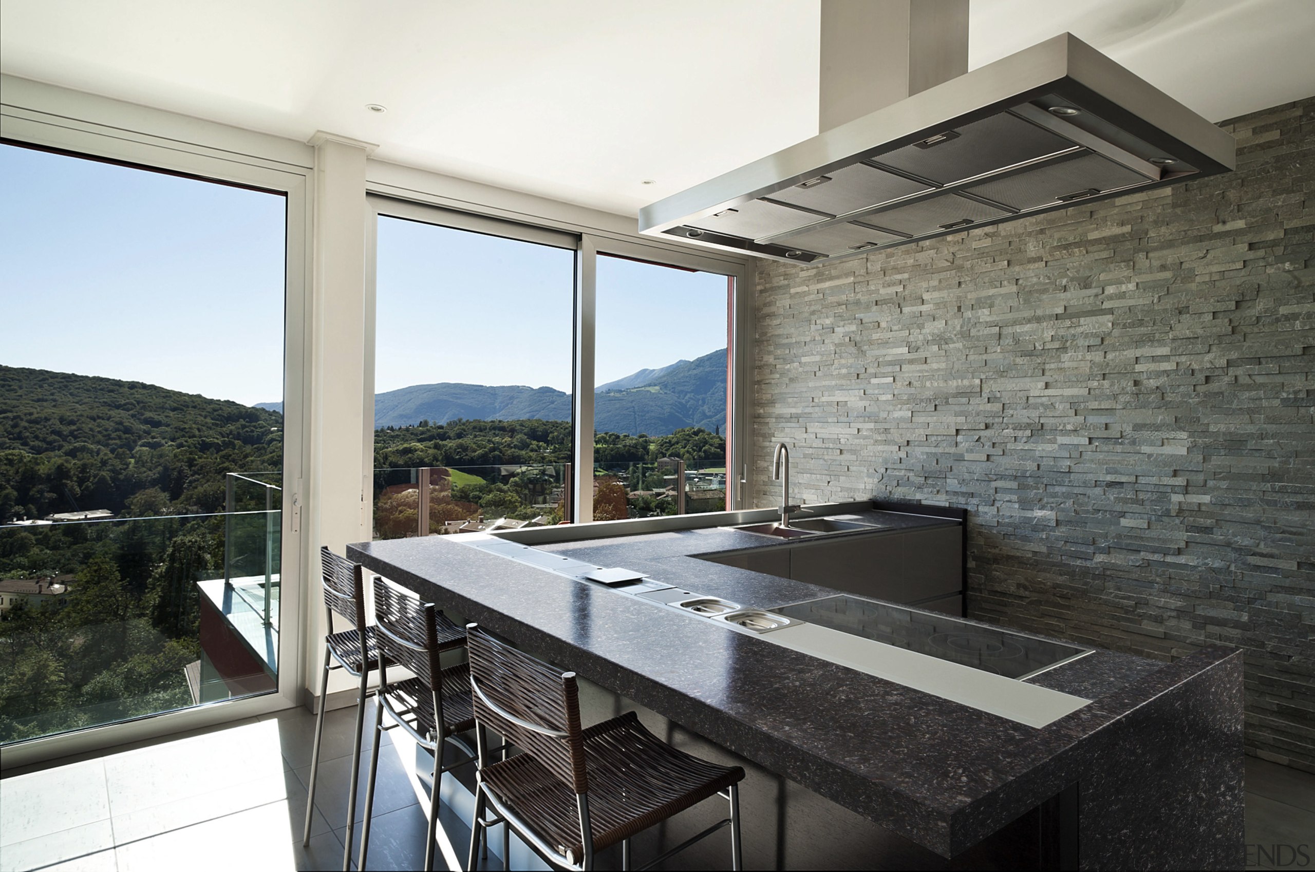 This kitchen features countertops in Atlantis from the architecture, daylighting, house, interior design, property, real estate, white, black