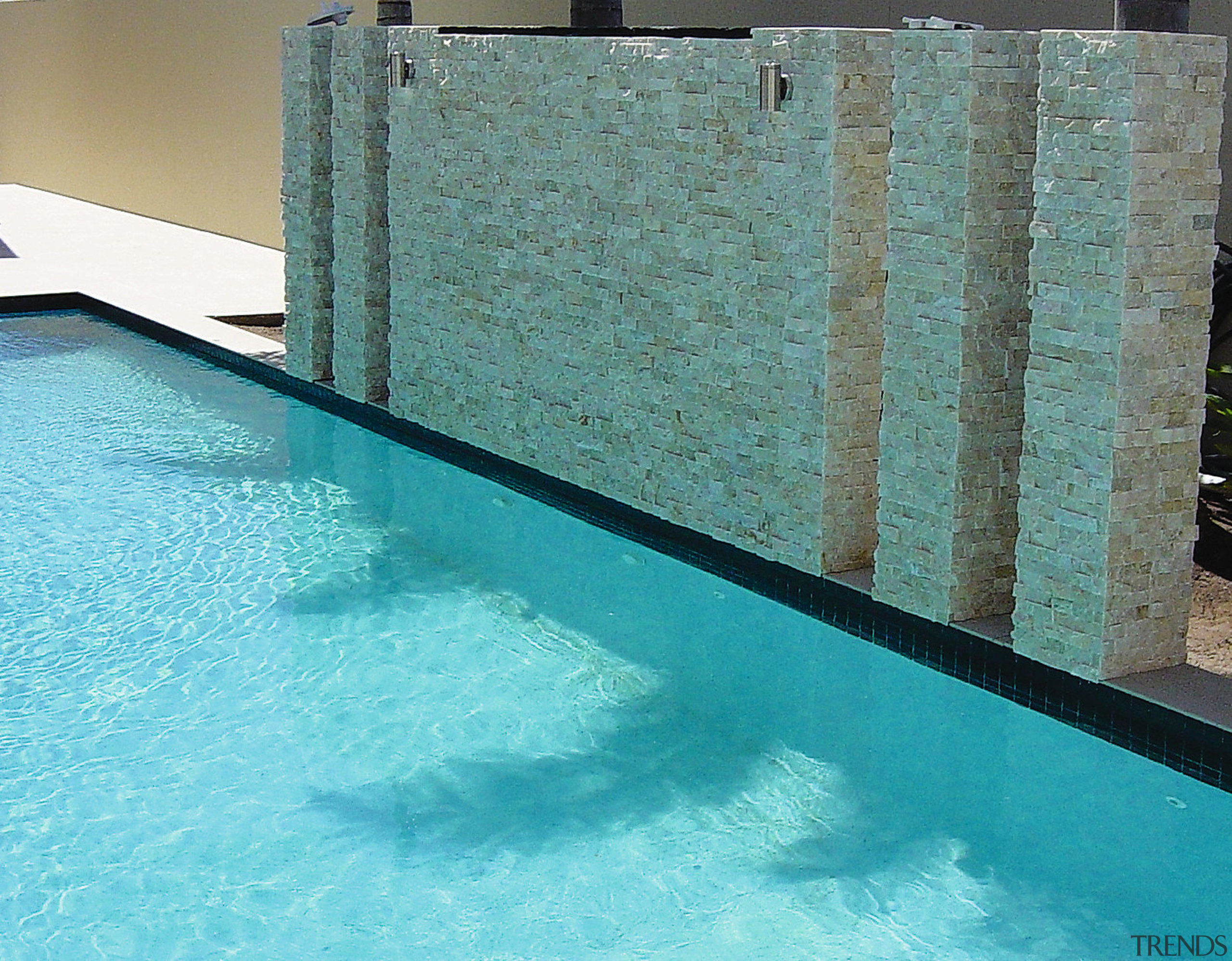 view of the homestone modulisednatural stone feature wall aqua, floor, leisure, property, swimming pool, wall, water, water resources, teal