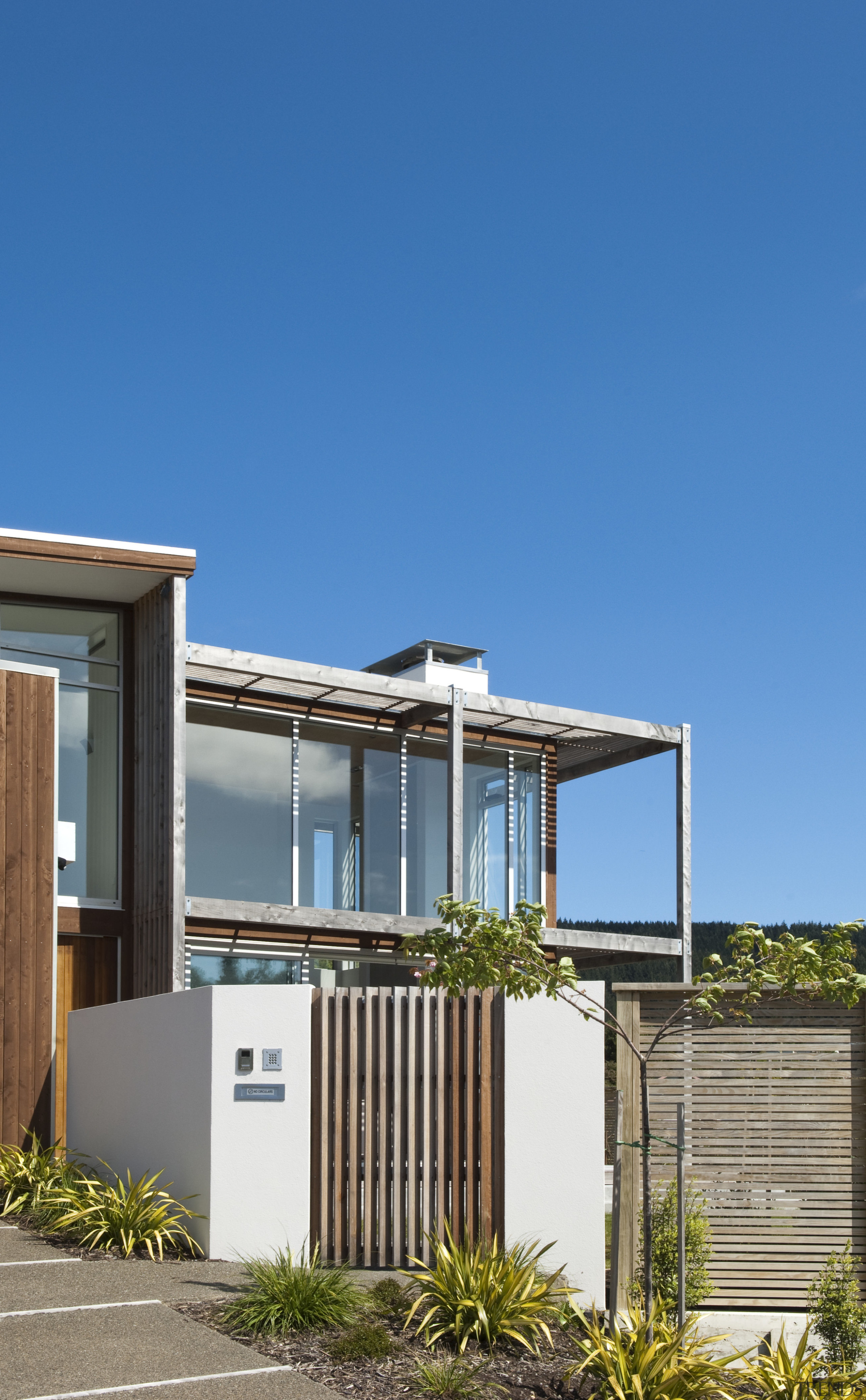 Exterior view of contemporary home. - Exterior view architecture, building, cottage, facade, home, house, property, real estate, residential area, sky, teal