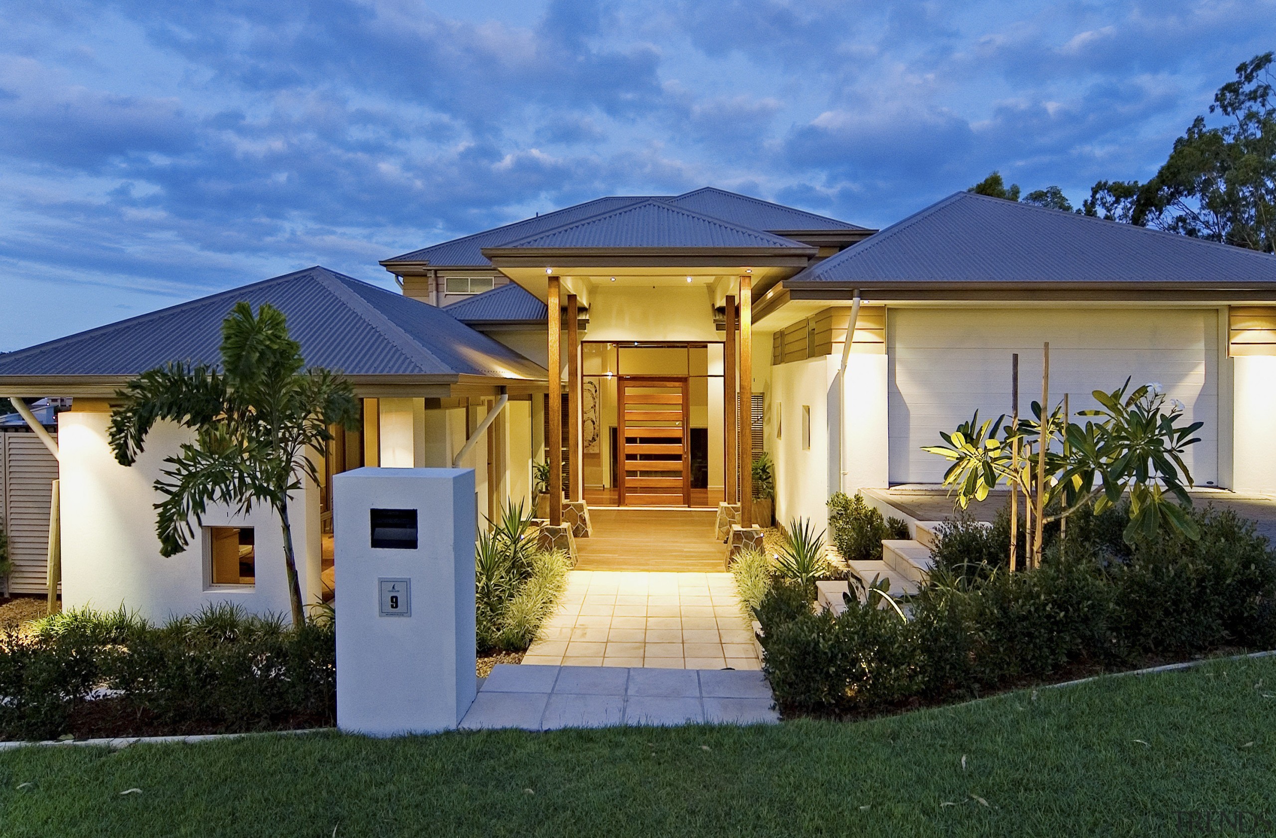 Coomera Waters in the burgeoning Brisbane to Gold cottage, elevation, estate, facade, home, house, lighting, mansion, property, real estate, residential area, roof, villa, teal