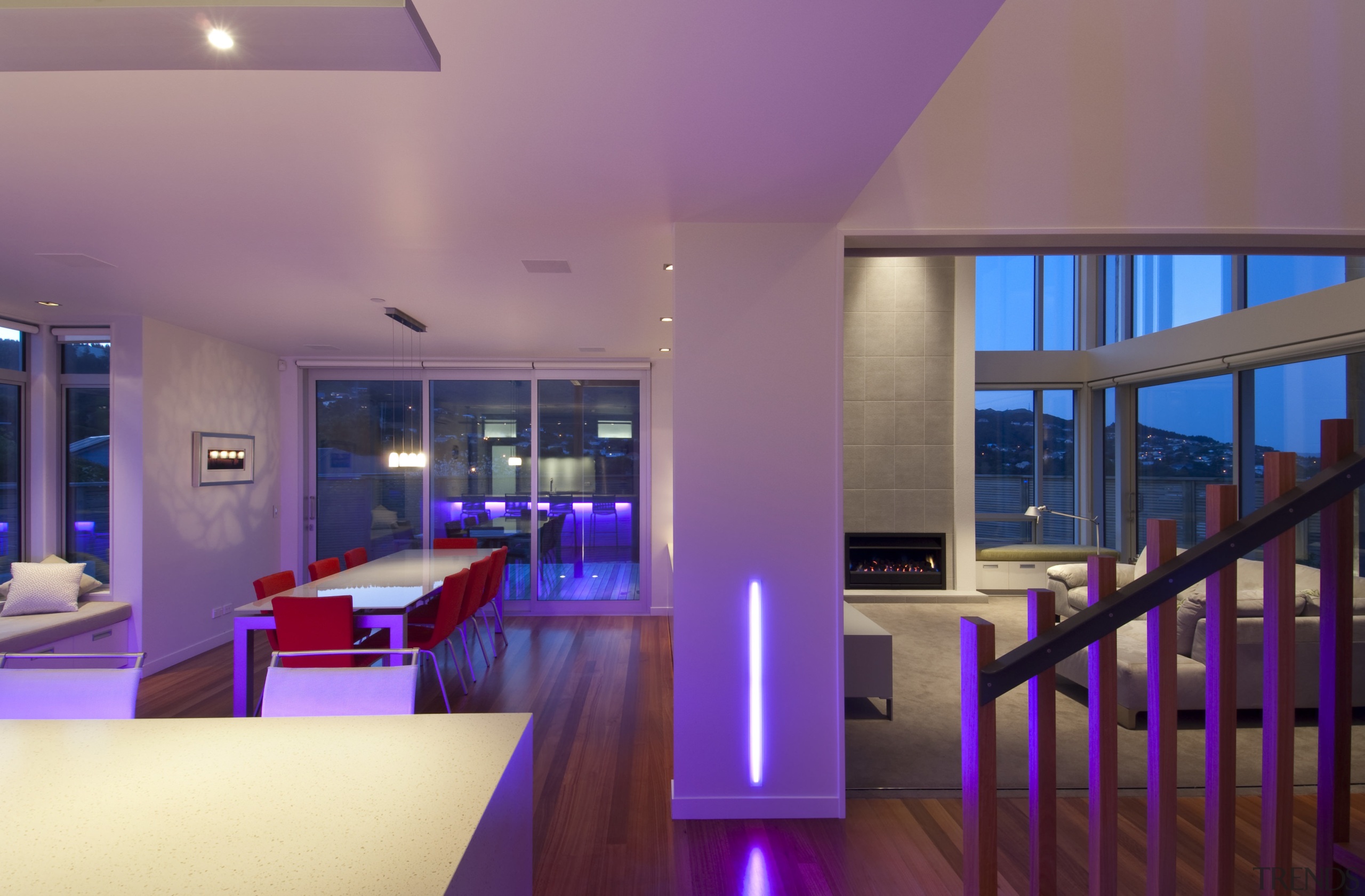 VIew of open plan kitchen and dining area apartment, architecture, ceiling, estate, home, house, interior design, lighting, living room, purple, real estate, room, window