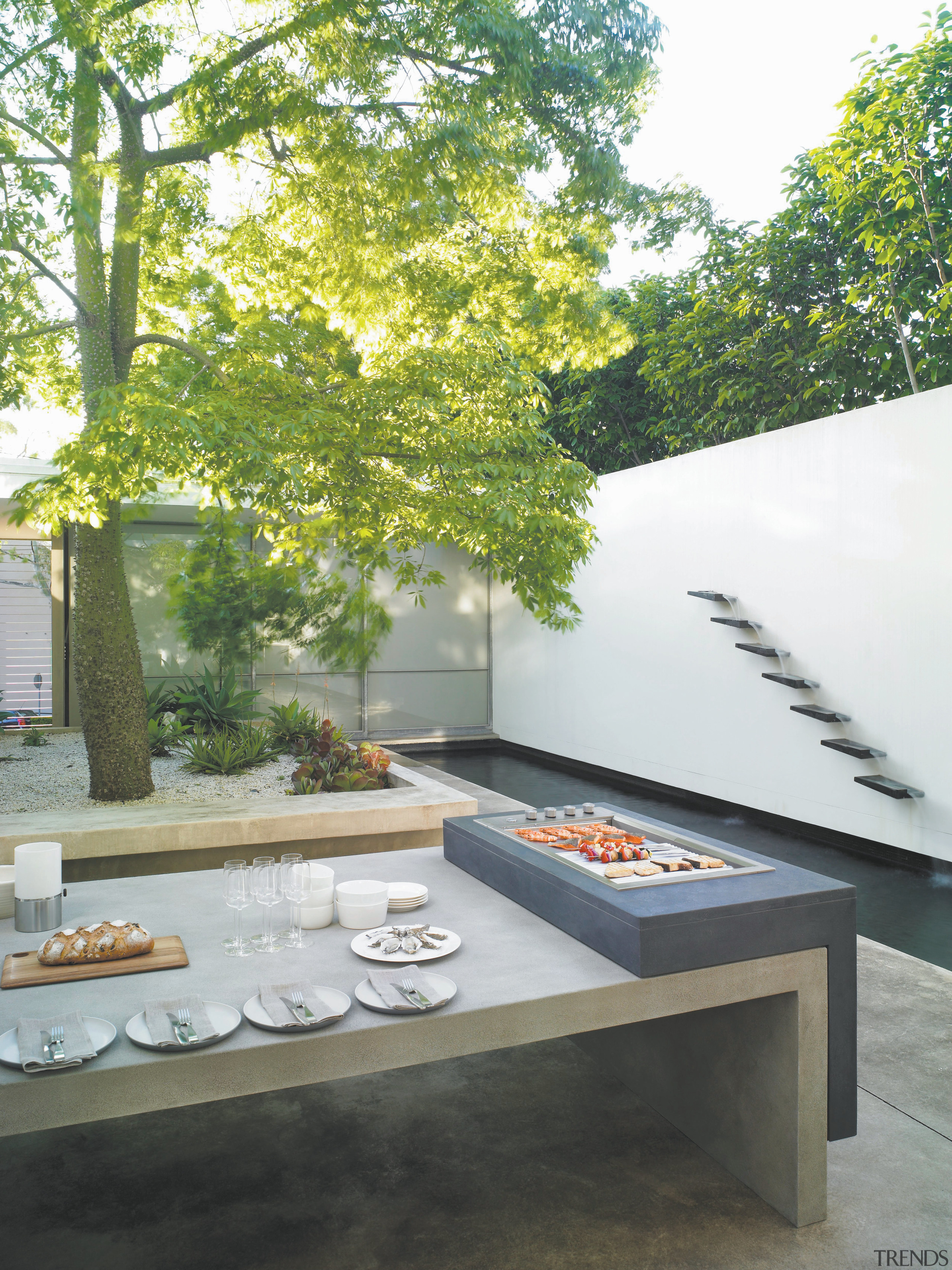 View of patio with modern design featuring the architecture, courtyard, furniture, home, house, interior design, property, table, white