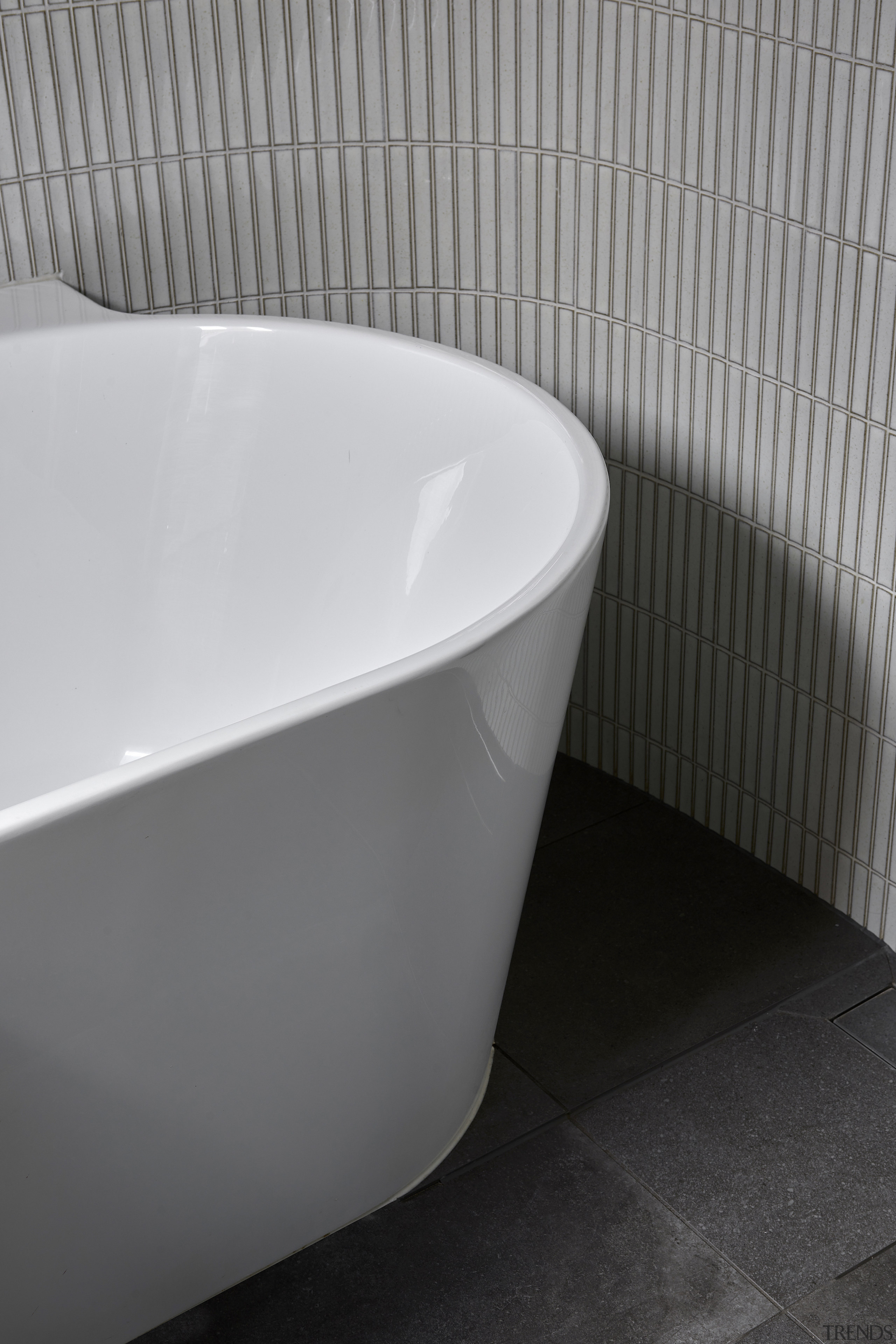 The freestanding bath was chosen for its curved 