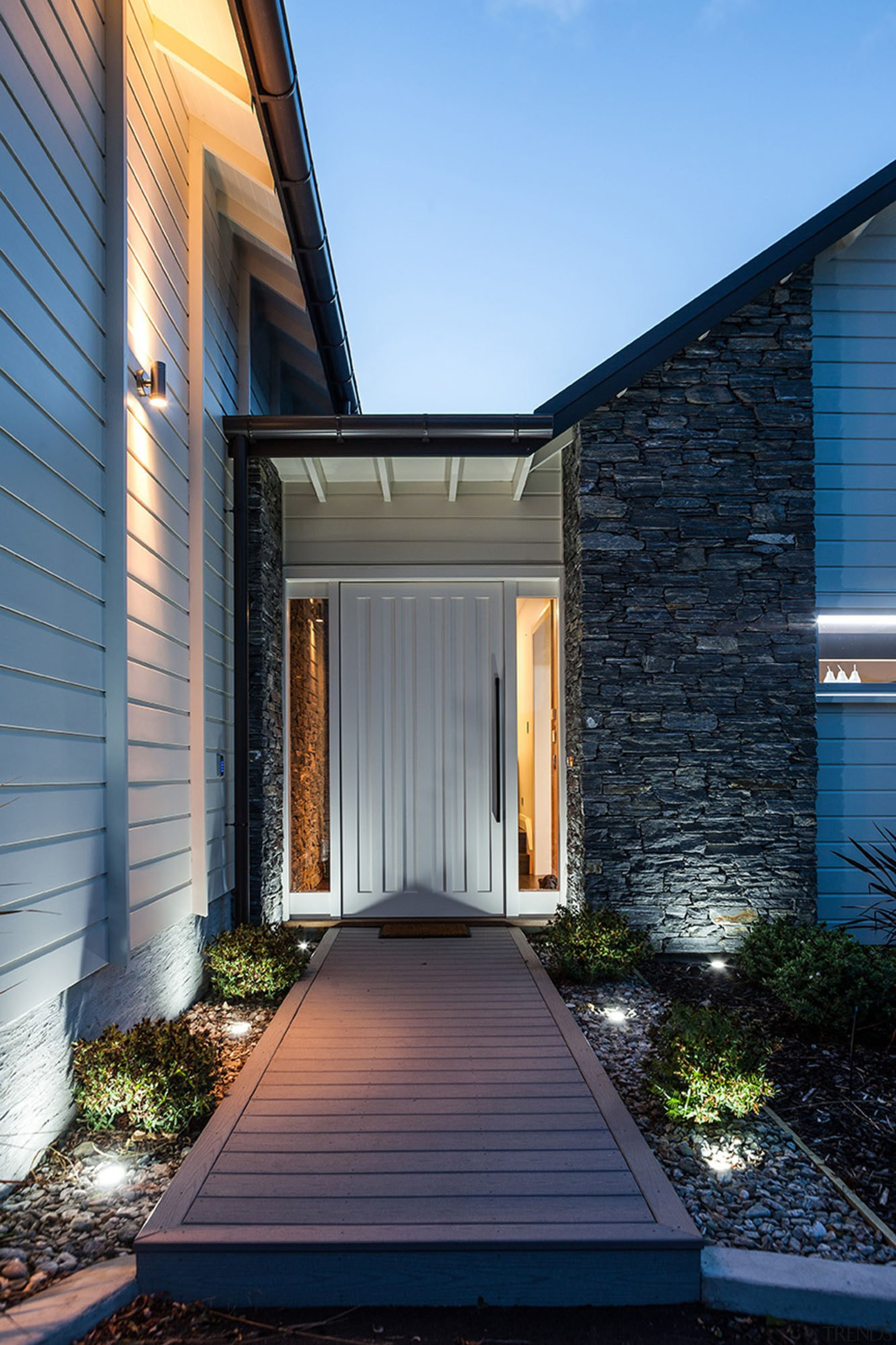 This home is stunning in so many ways. architecture, building, courtyard, estate, facade, home, house, property, real estate, residential area, siding, sky, window, black