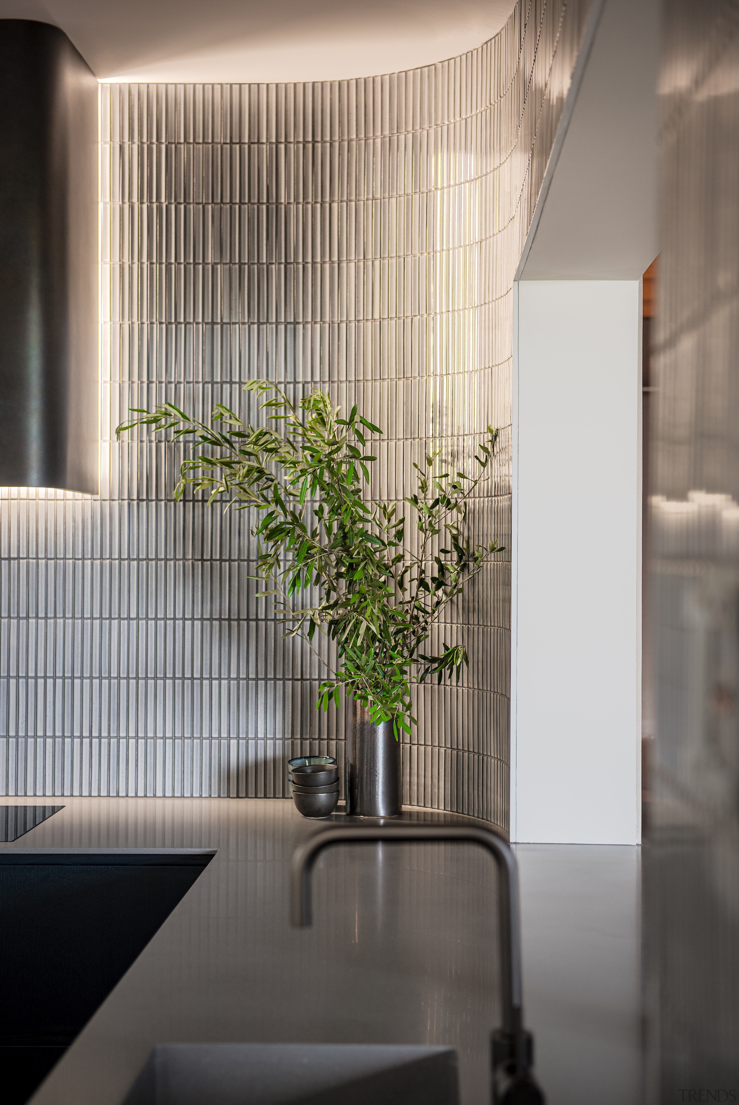 Mosaic/kitkat tiles provide a cohesiveness in colour and 