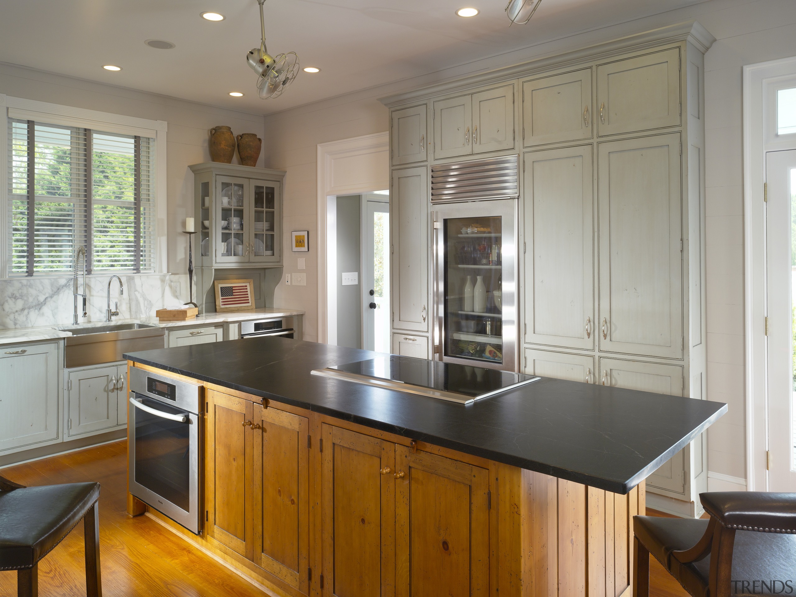 View of a remodelled kitchen in this 1832 cabinetry, countertop, cuisine classique, floor, flooring, hardwood, home, interior design, kitchen, real estate, room, window, wood flooring, gray