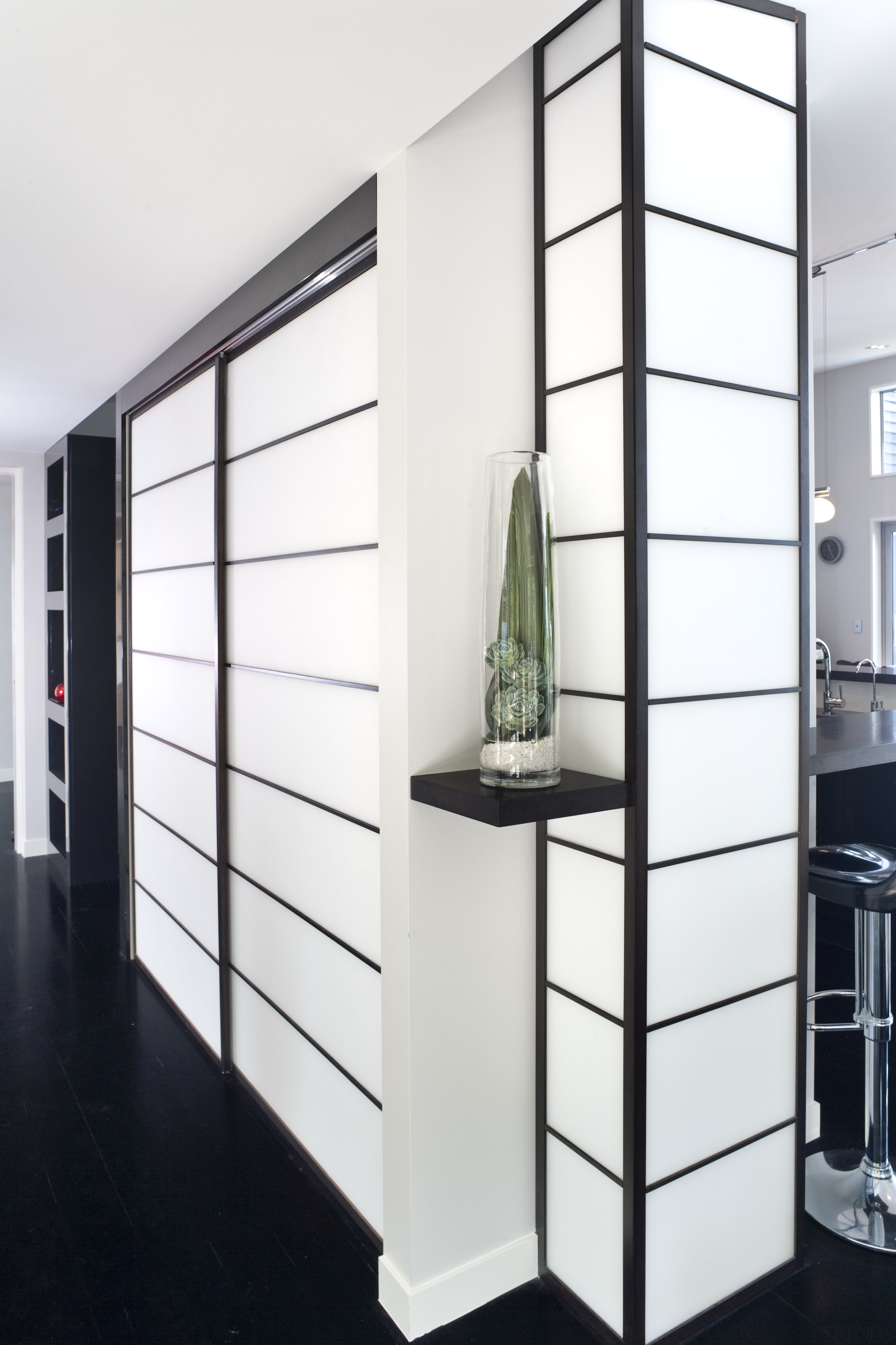 View of kitchen designed by Celia Visser of display case, furniture, product design, shelf, shelving, white