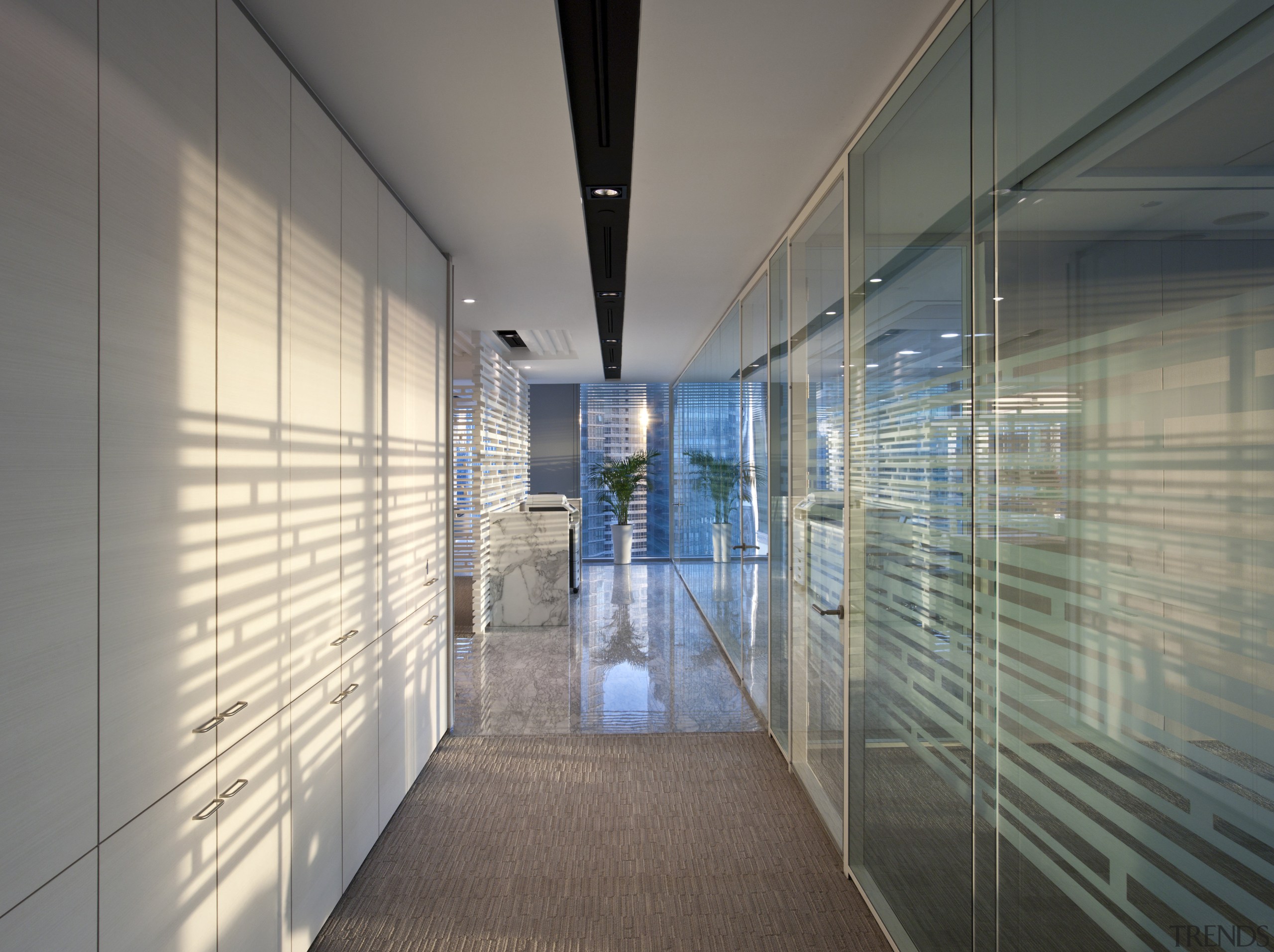 A simple corridor behind the reception area of architecture, ceiling, daylighting, glass, interior design, lobby, real estate, gray
