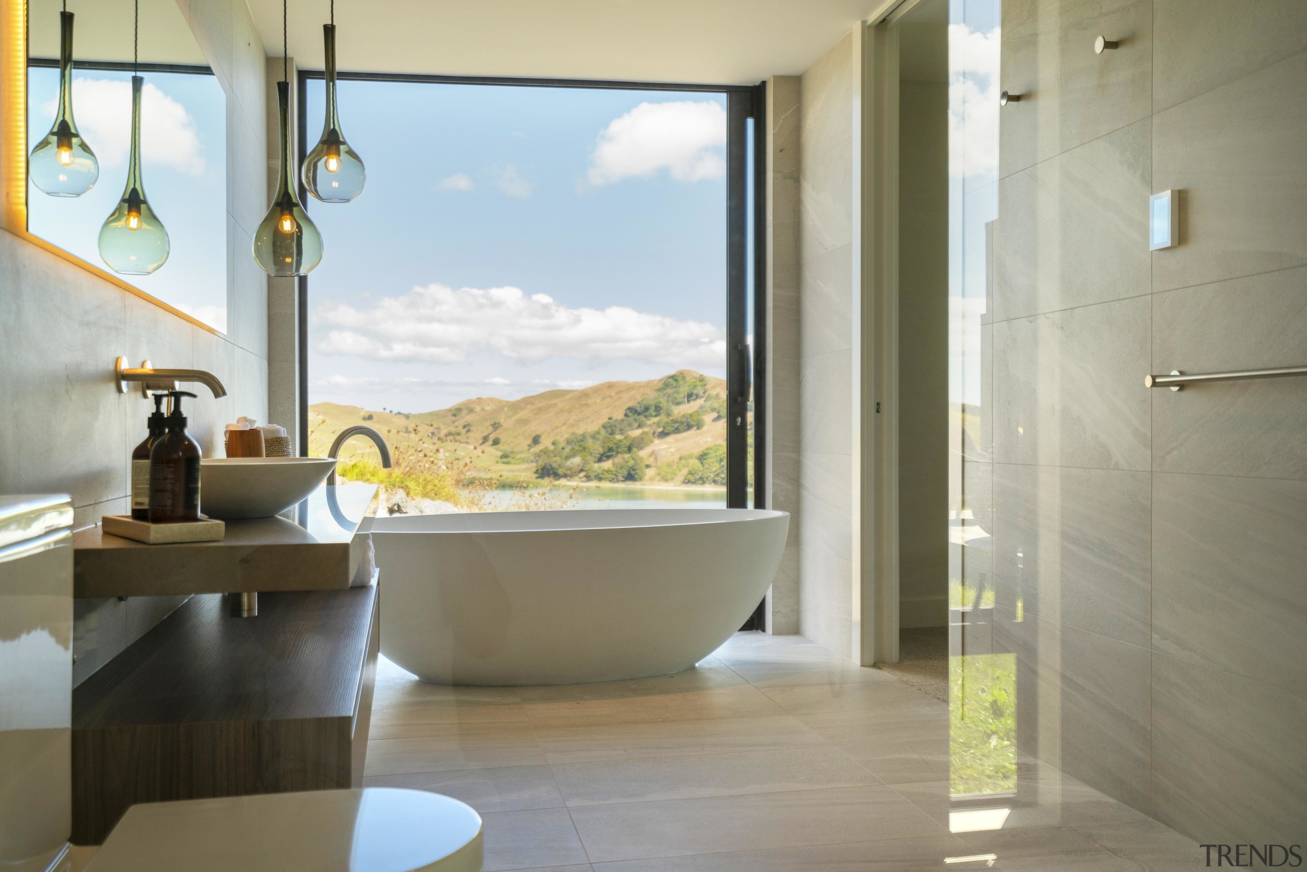 In this master ensuite blessed with spectacular views, gray