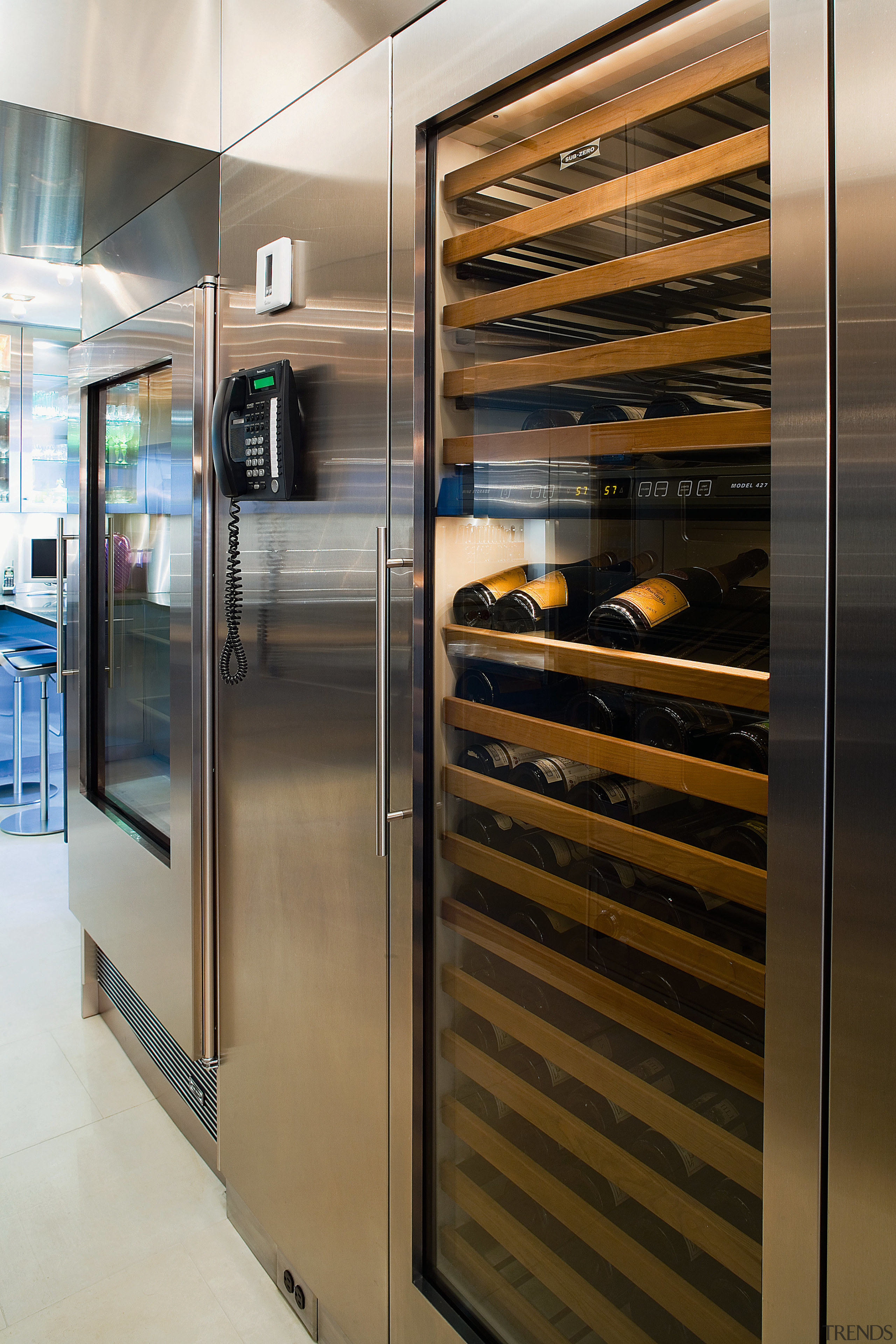 A view of a kitchen by St Charles home appliance, kitchen, major appliance, refrigerator, brown