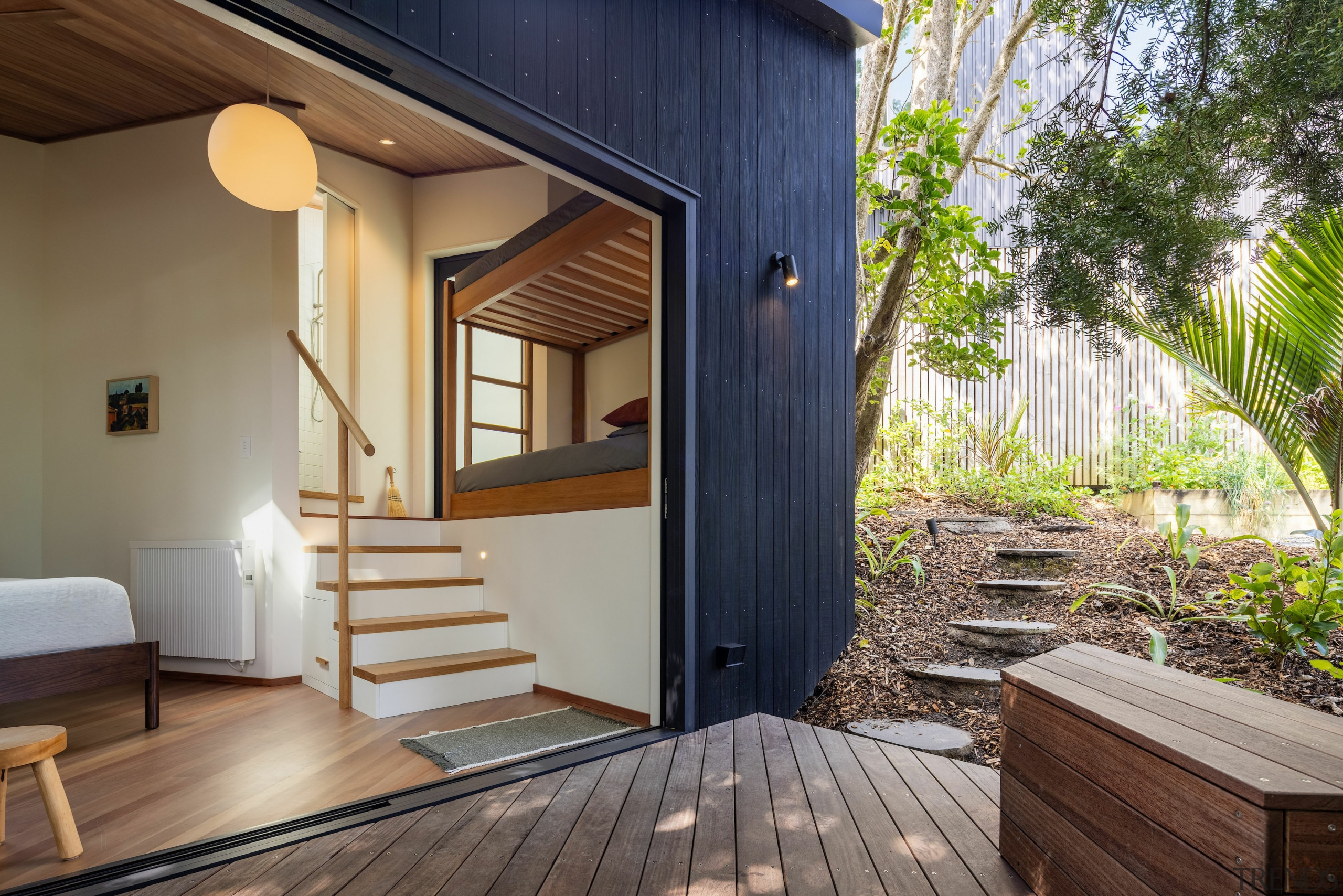 A small deck is positioned outside the stacking 