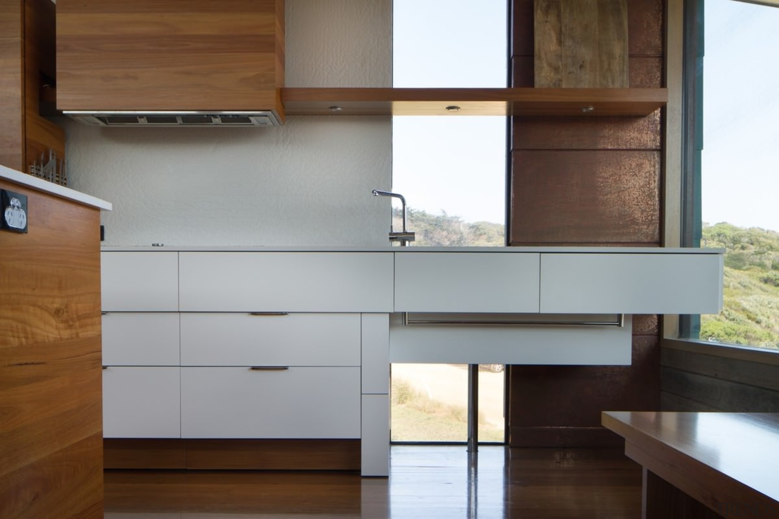 This window runs down to the floor – architecture, cabinetry, chest of drawers, countertop, furniture, hardwood, interior design, kitchen, wood, brown, white