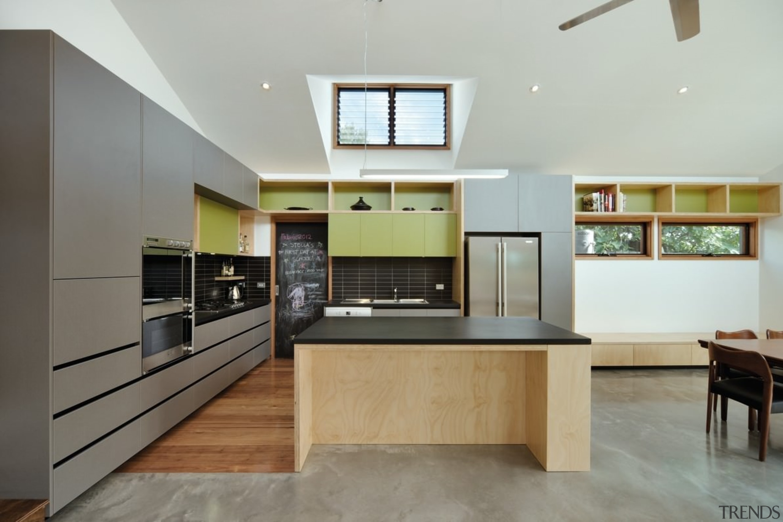A clerestory window illuminates the olive and grey cabinetry, countertop, interior design, kitchen, living room, real estate, room, gray