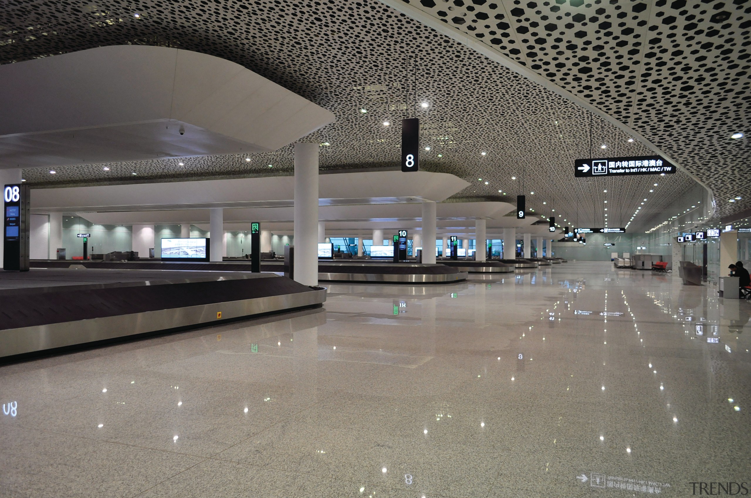 The check-in islands, gates and passport-check area all airport, airport terminal, architecture, building, daylighting, infrastructure, metropolitan area, gray