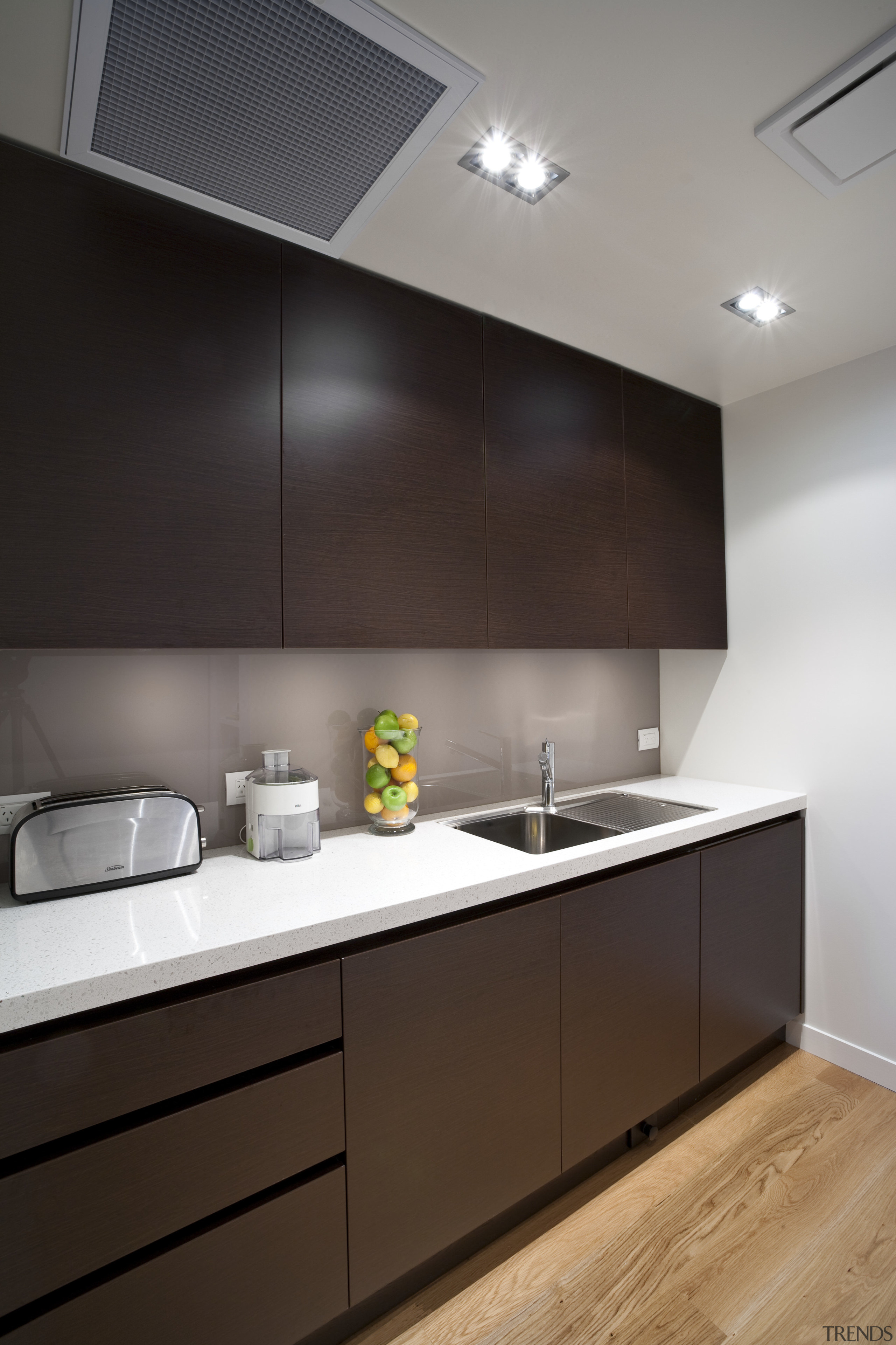View of a contemporary kitchen manufactured and installed architecture, cabinetry, ceiling, countertop, interior design, kitchen, product design, sink, under cabinet lighting, black, gray