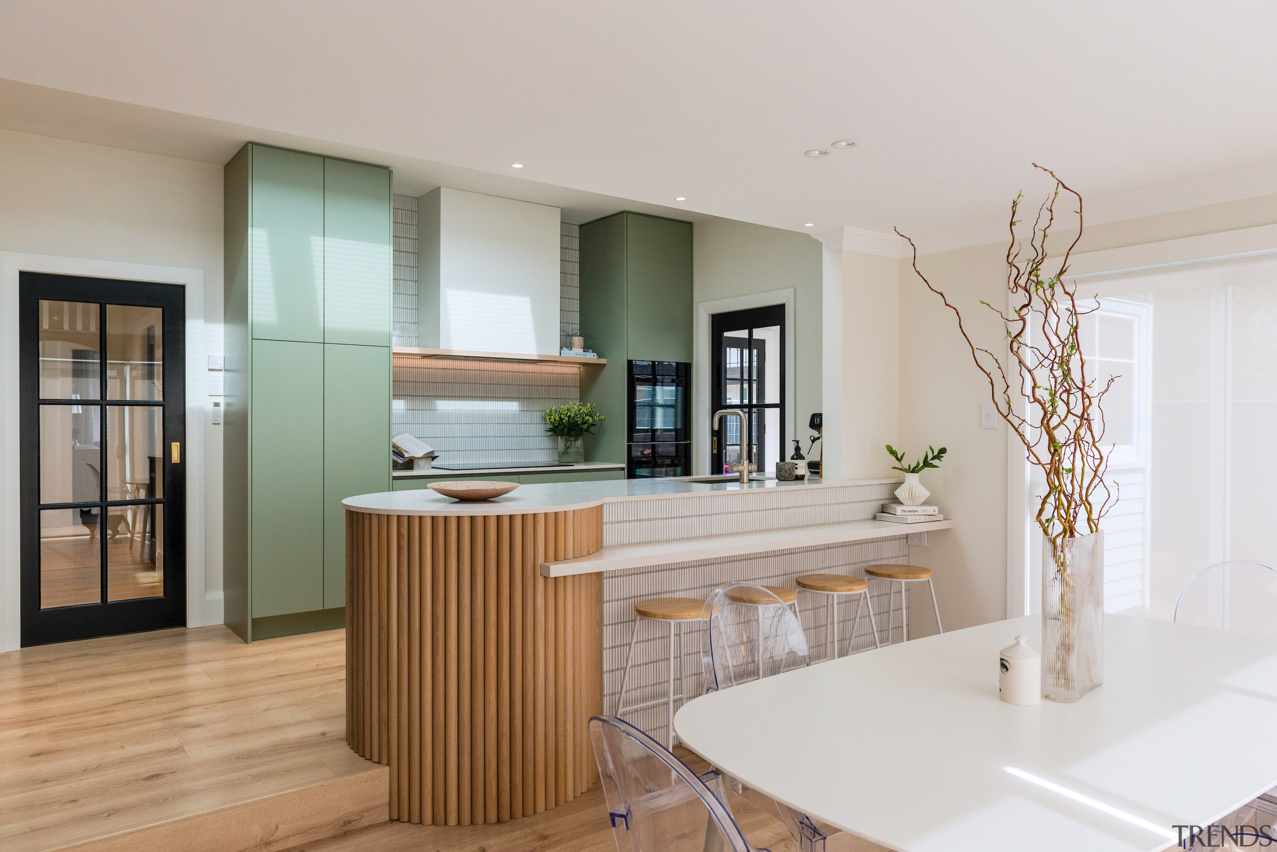 This modern kitchen design seamlessly blends functionality and 