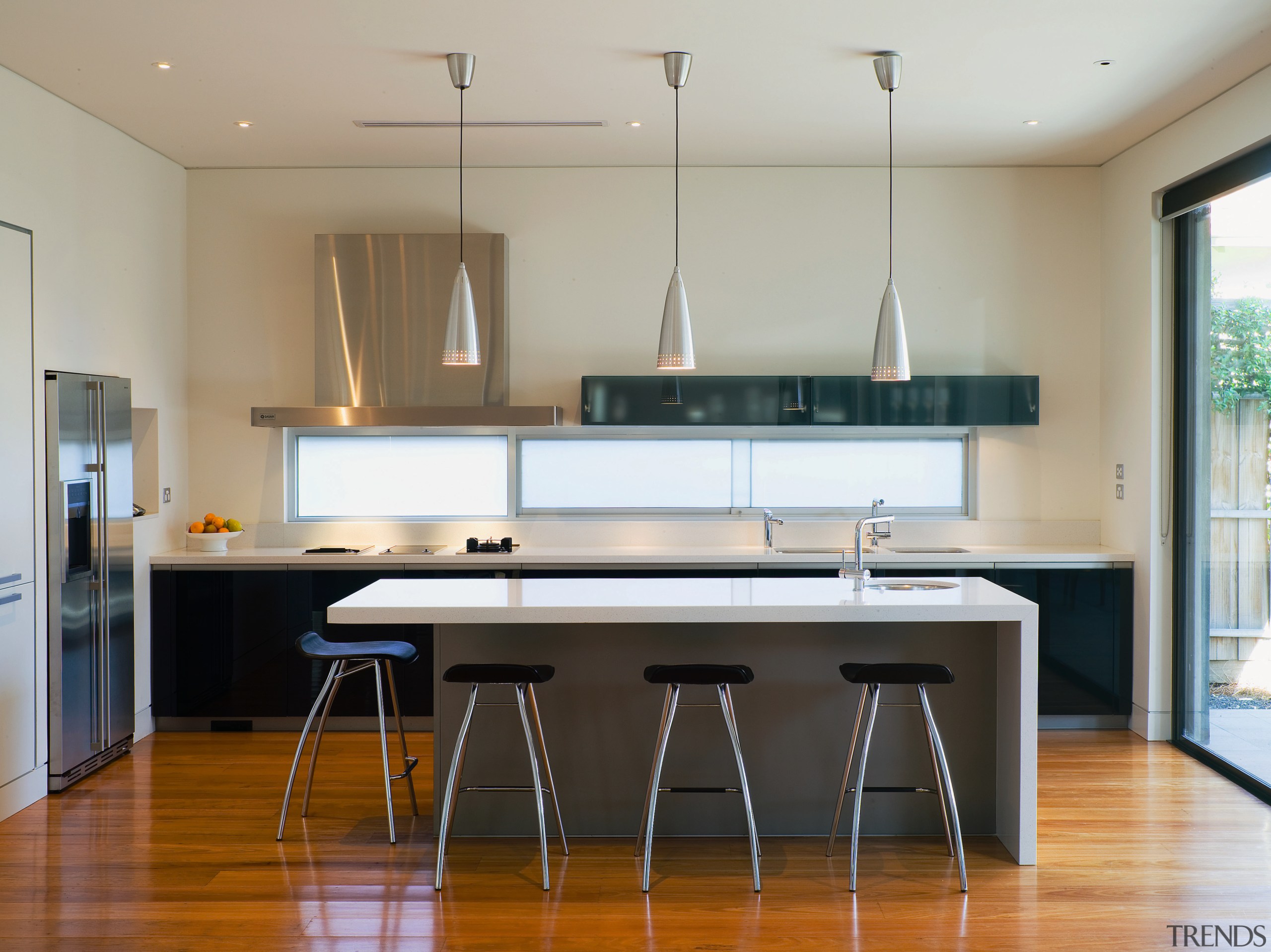 A view of the kitchen, wooden flooring and countertop, floor, furniture, interior design, kitchen, real estate, room, table, gray