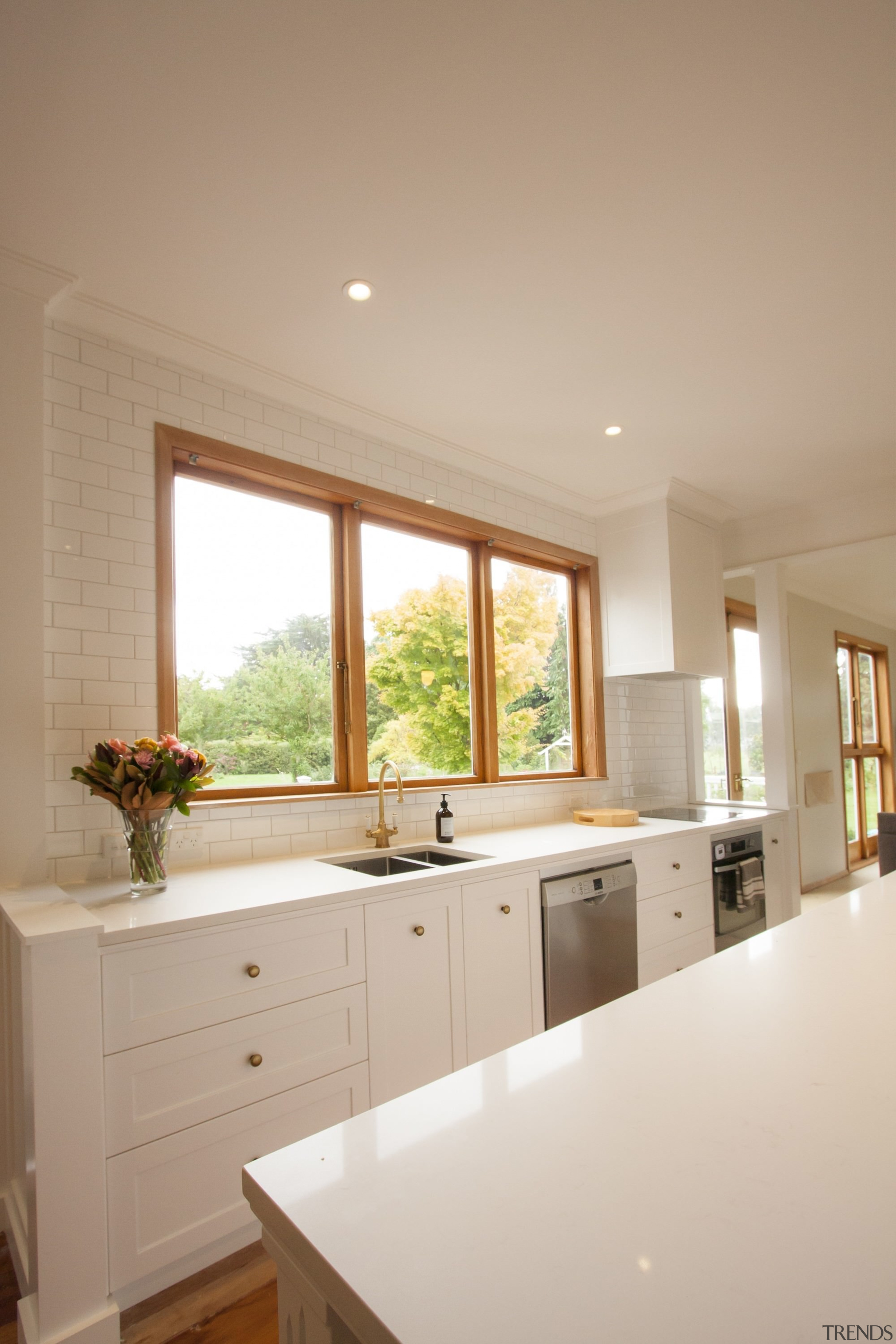 TIDA NZ 2017 – Designer kitchen entrant – cabinetry, ceiling, countertop, daylighting, floor, flooring, home, house, interior design, kitchen, real estate, room, sink, window, gray, brown