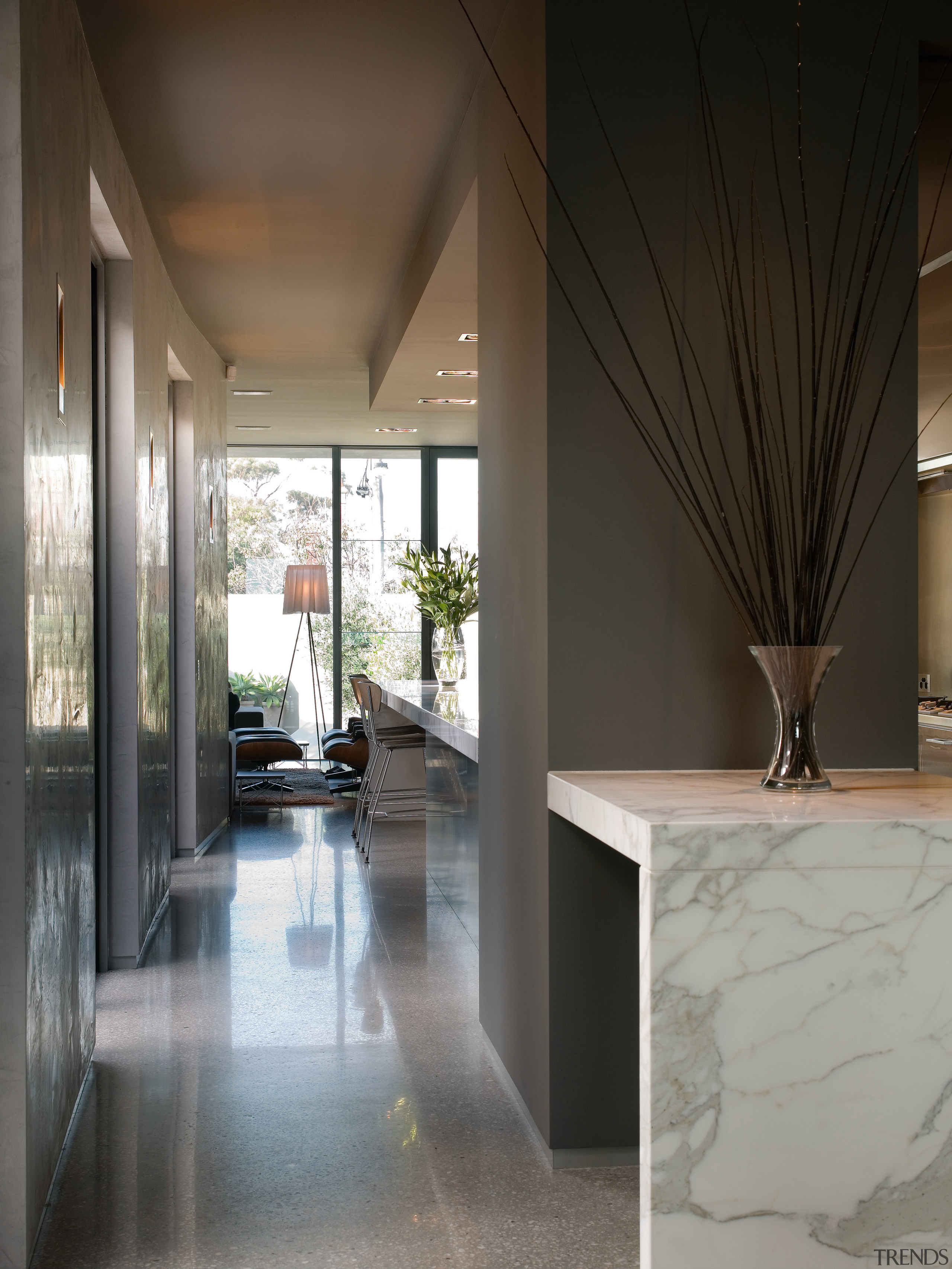 A view of this kitchen featuring polished concrete architecture, ceiling, floor, flooring, home, house, interior design, lobby, real estate, black, gray