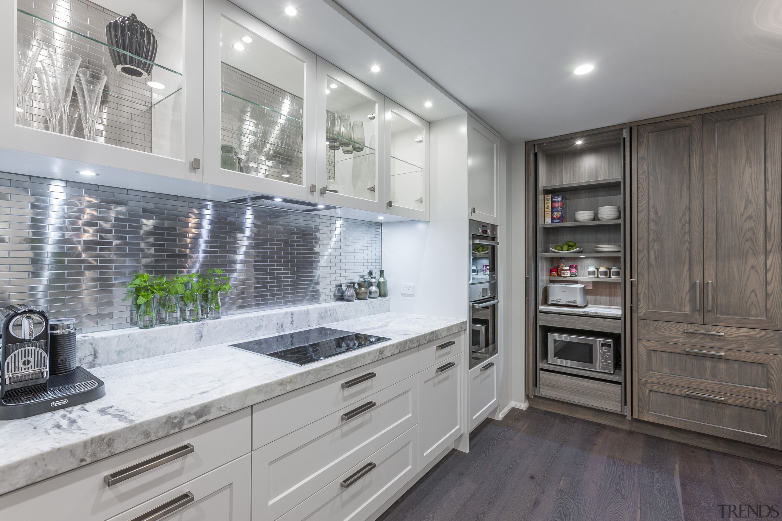 On this kitchen project by designer Kira Gray, cabinetry, countertop, cuisine classique, home appliance, interior design, kitchen, gray