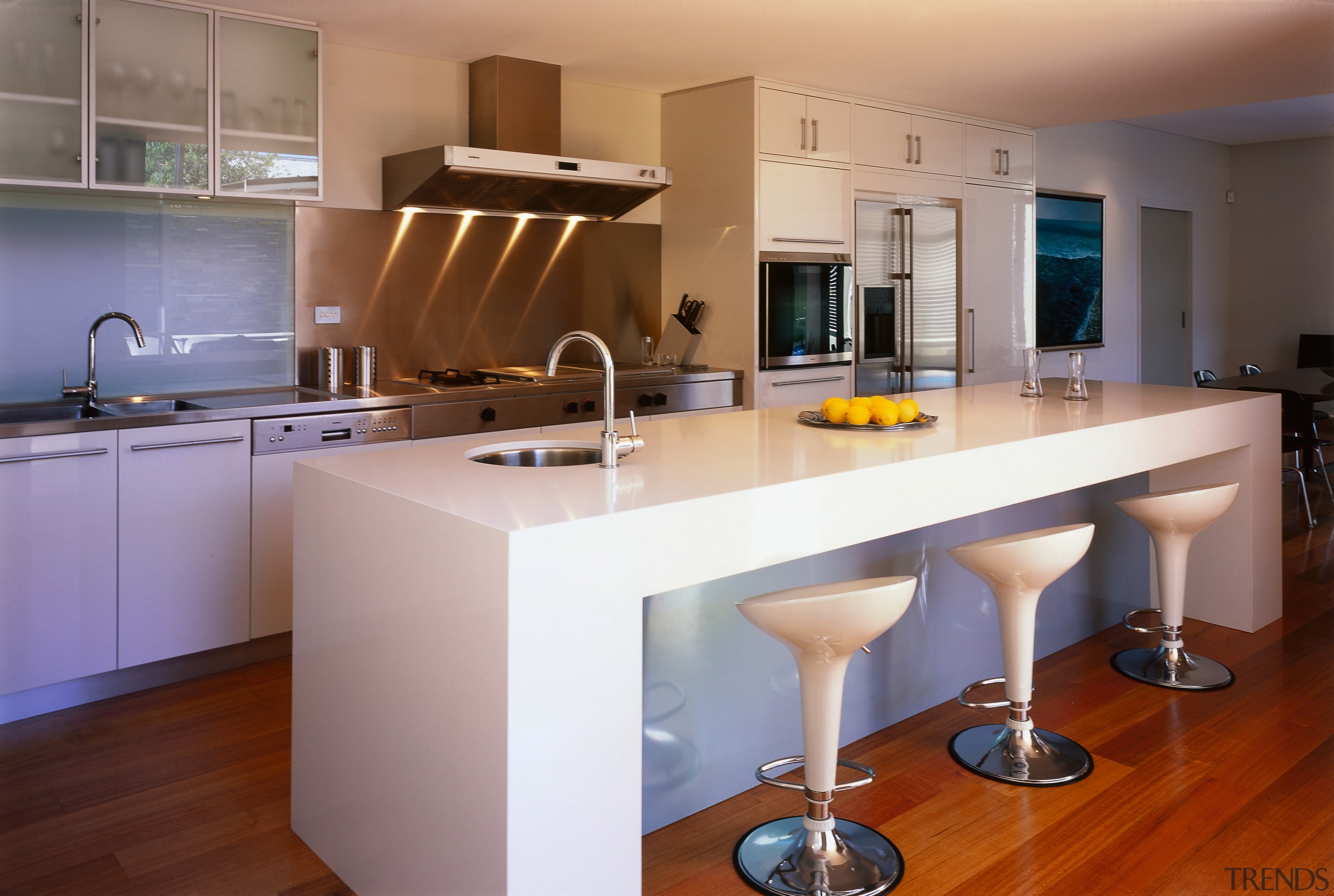 Interior view of kitchen and breakfast bar. - cabinetry, countertop, cuisine classique, floor, hardwood, interior design, kitchen, real estate, room, brown