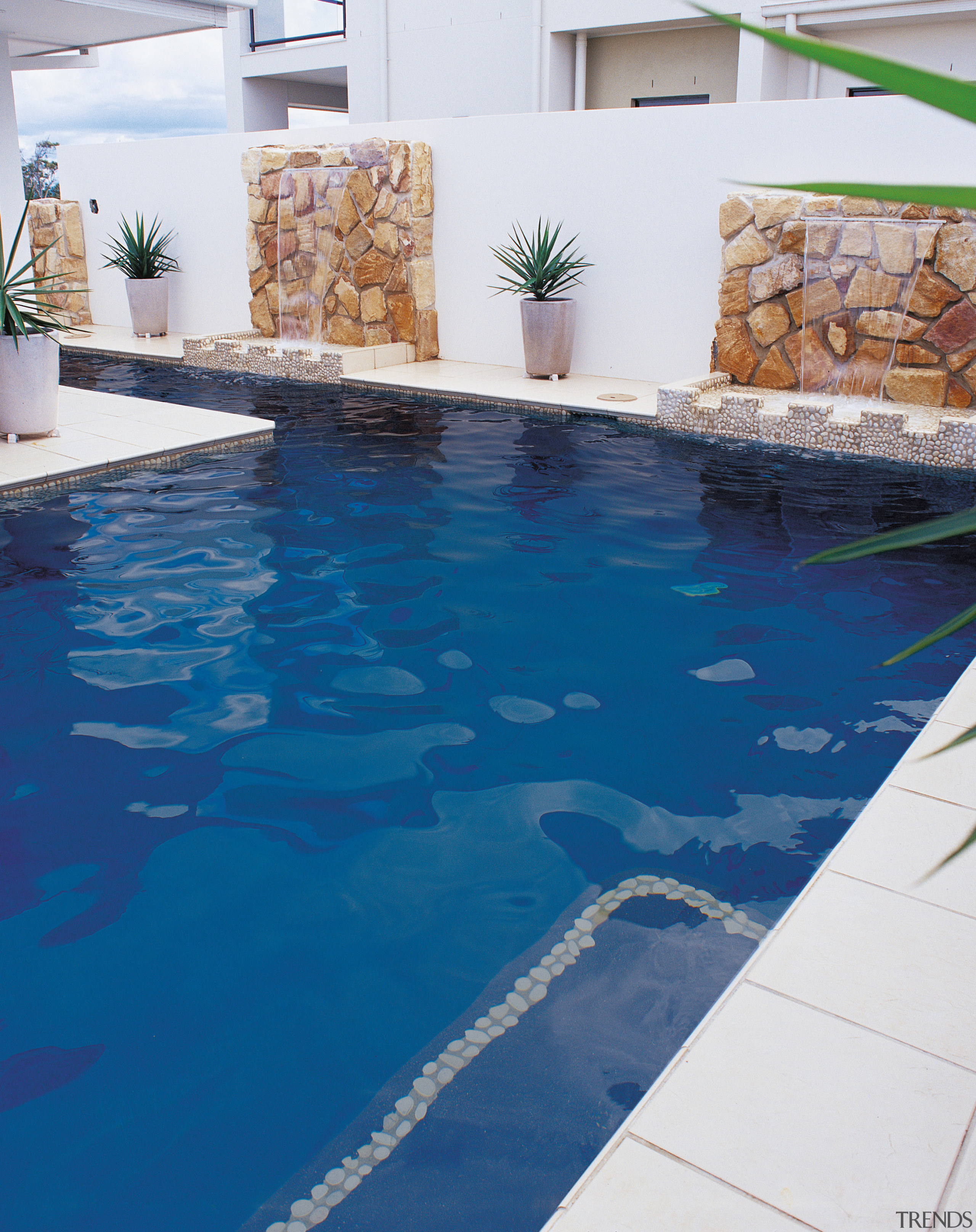 View of blue pool with white surrounding pavers floor, flooring, leisure, property, swimming pool, water, blue, white