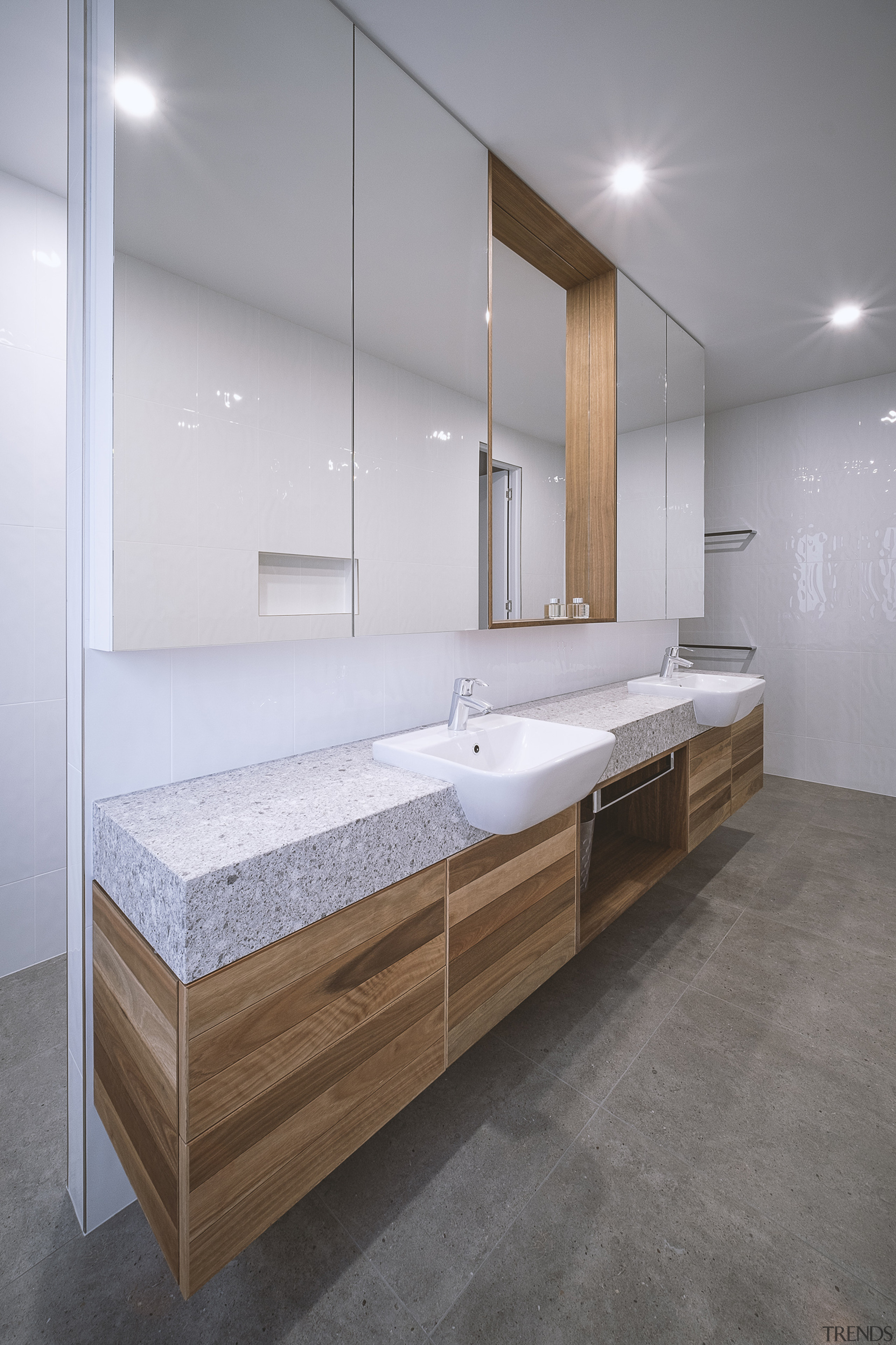 Natural accents continue into the master bathroom. 