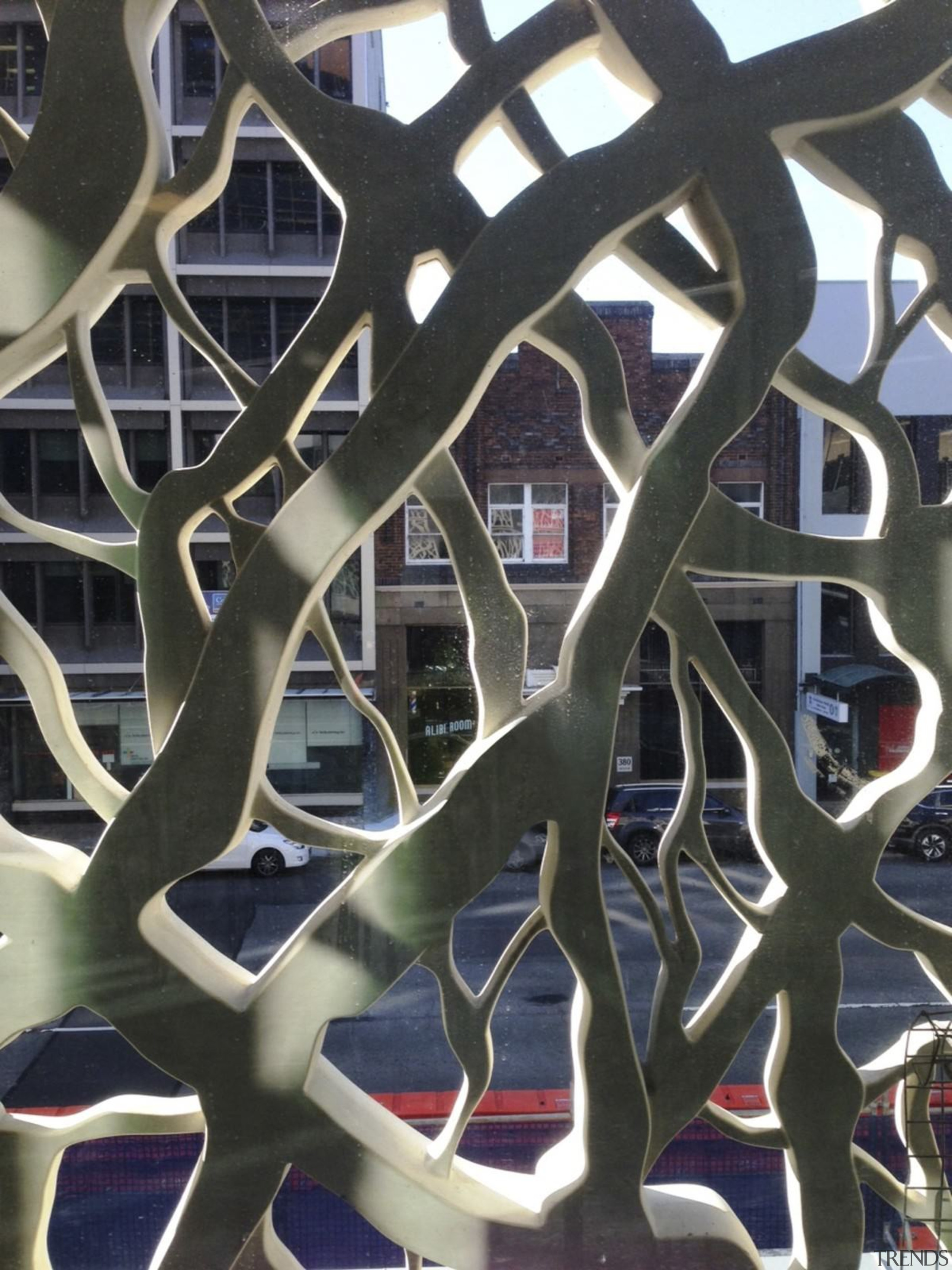 Newcastle Courthouse – Cox Architecture - Newcastle Courthouse iron, metal, pattern, spoke, wheel, black