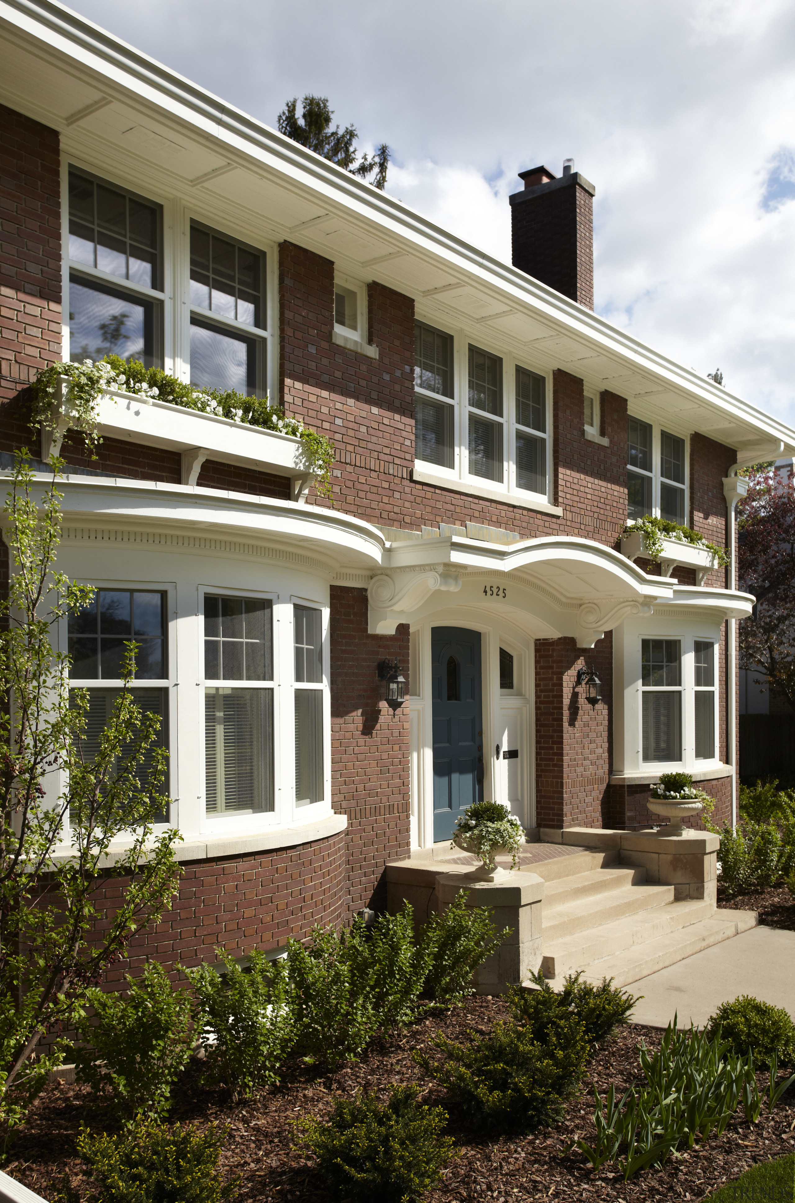 Built in 1912, this house has more than building, cottage, elevation, estate, facade, historic house, home, house, mansion, neighbourhood, outdoor structure, porch, property, real estate, residential area, siding, window, brown, white