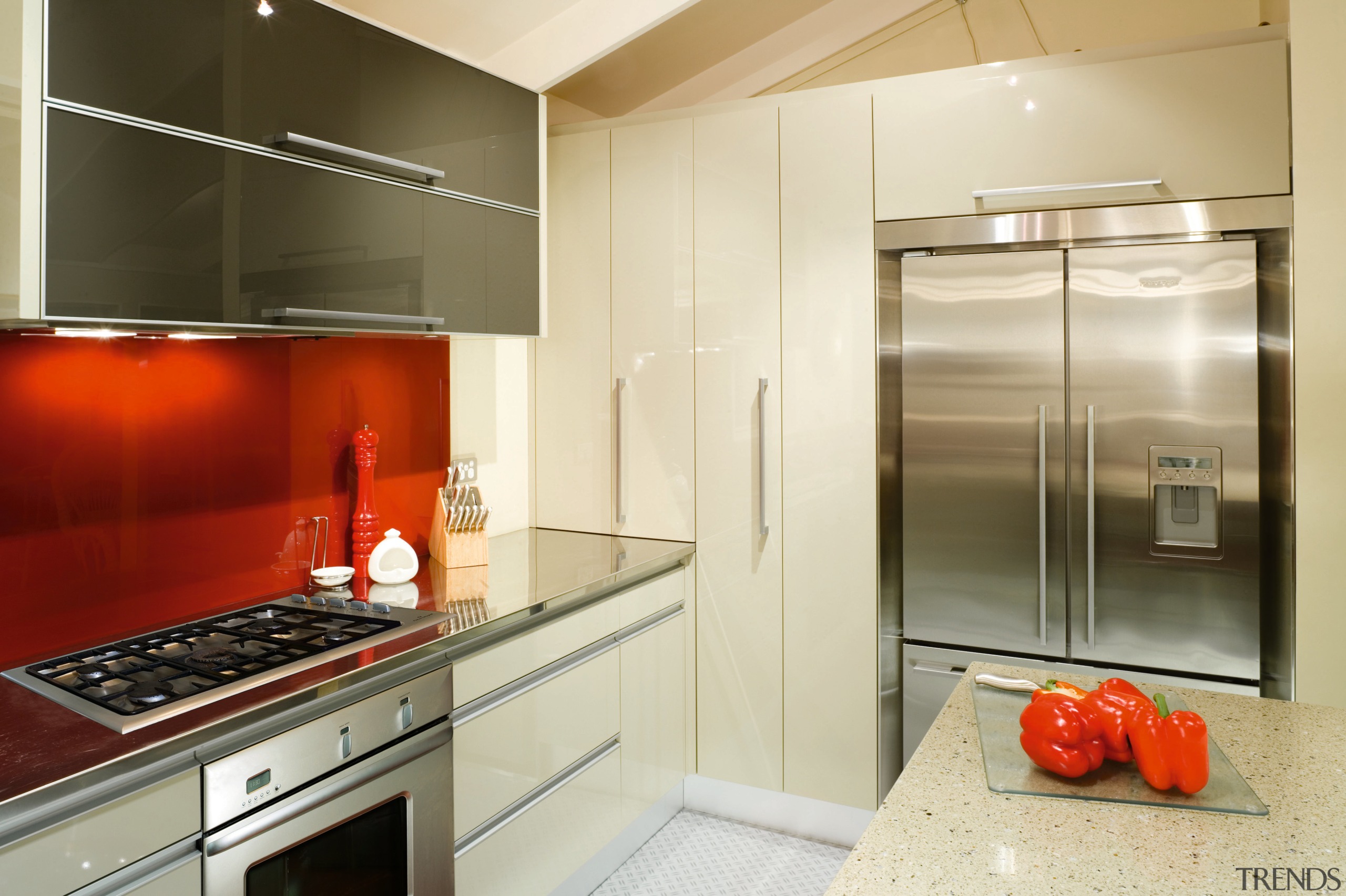 A view of this kitchen featuring quarell and cabinetry, countertop, home appliance, interior design, kitchen, room, yellow