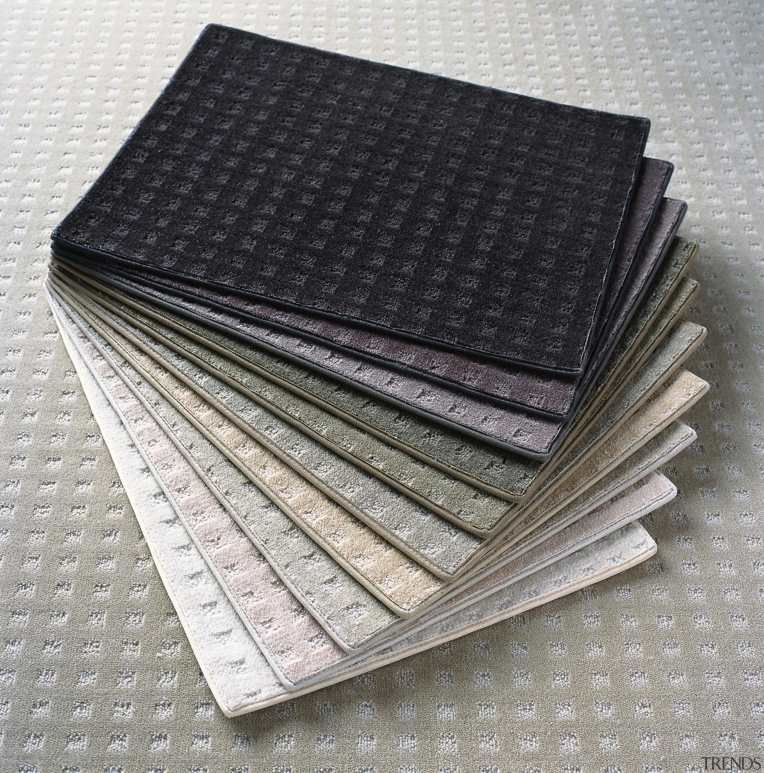 Range of carpet samples. - Range of carpet white, black
