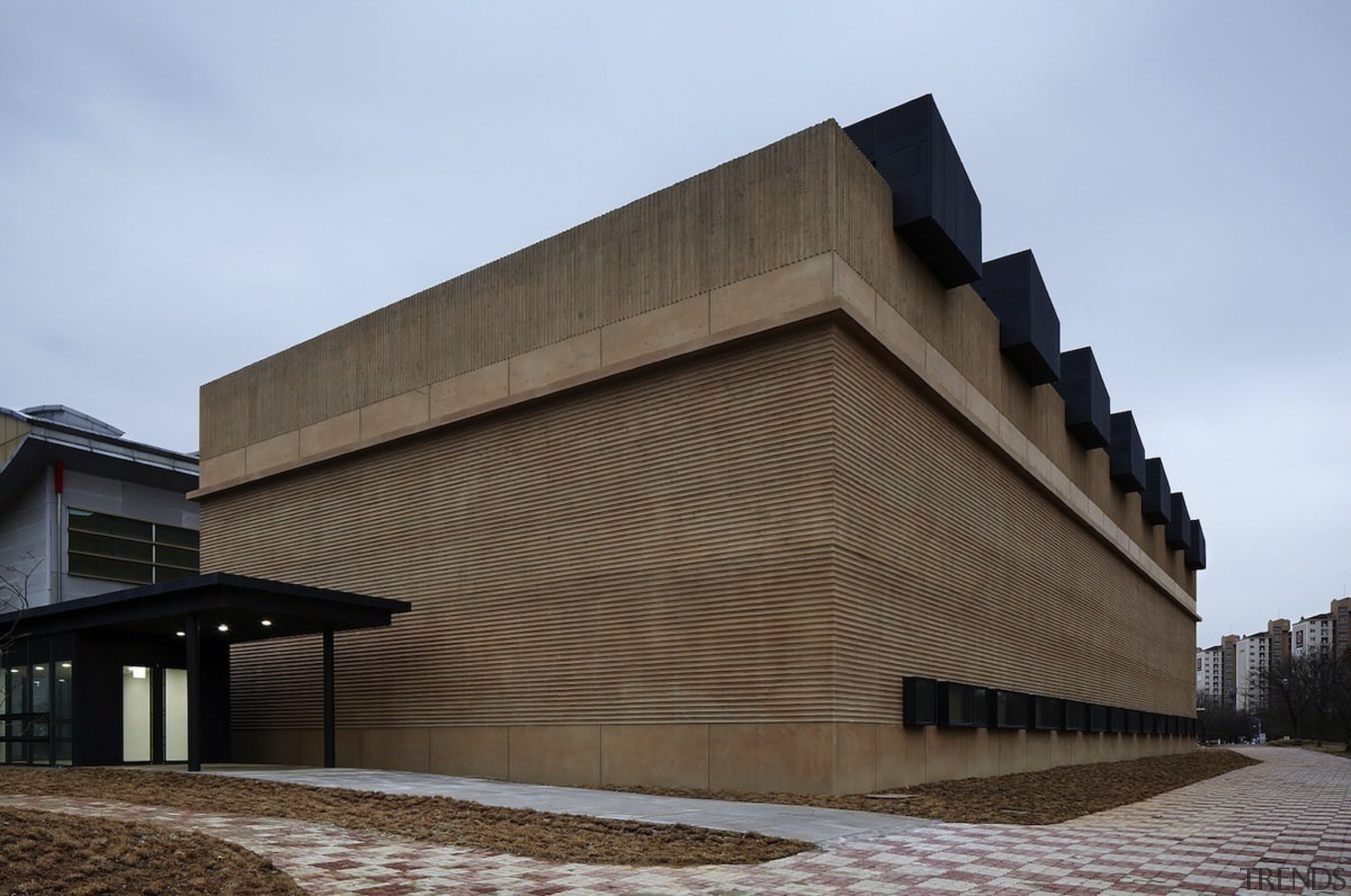 The court certainly has a natural aesthetic - architecture, brutalist architecture, building, corporate headquarters, facade, structure, teal, black