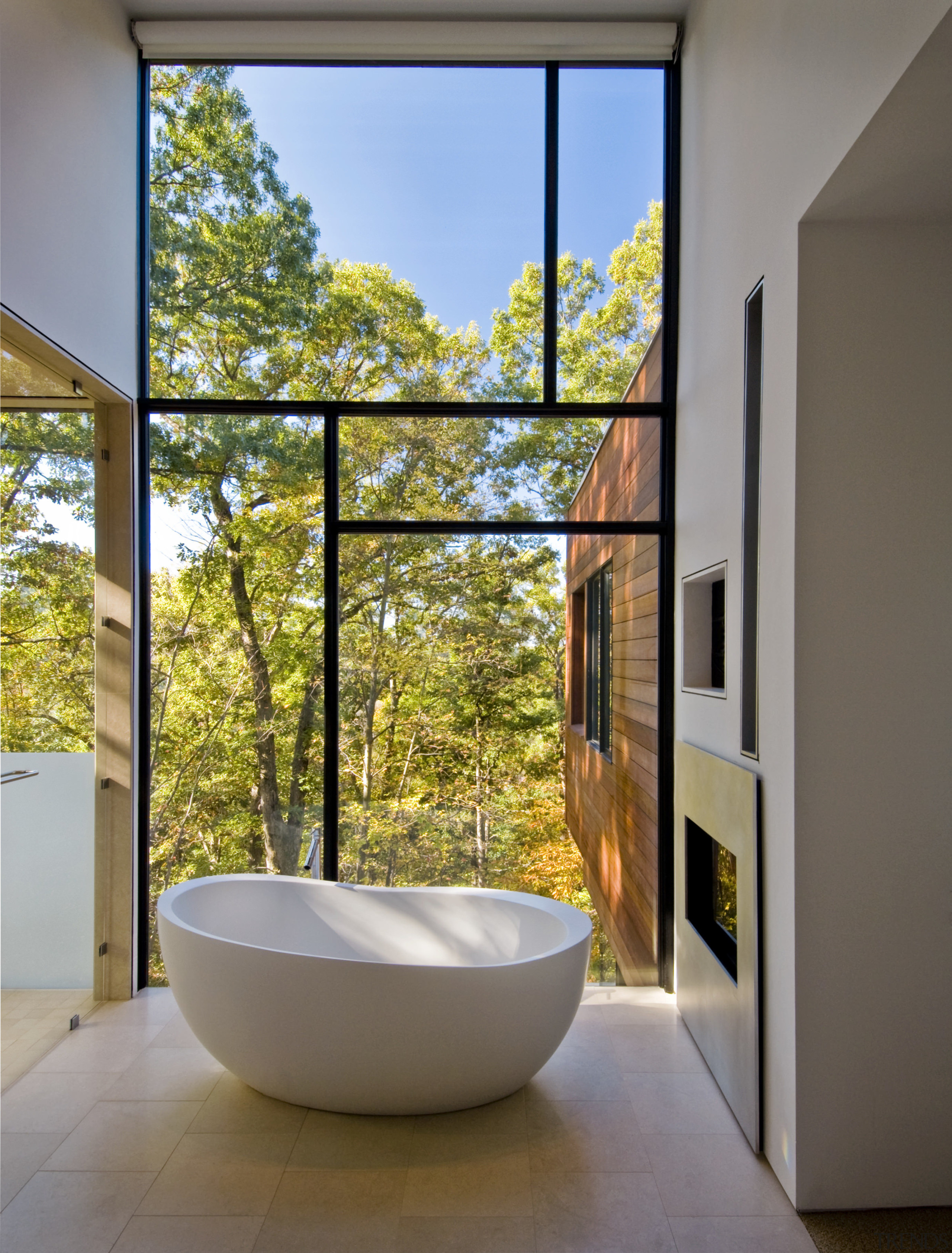 The centre piece of the bathroom is an architecture, bathroom, daylighting, estate, home, house, interior design, real estate, room, window, gray, brown