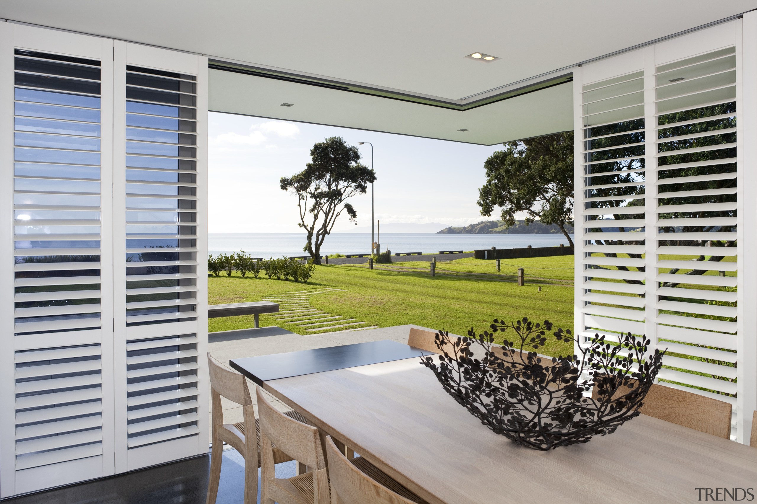 This house was designed by Hamish Cameron NZIA door, estate, home, house, interior design, property, real estate, shade, window, window blind, window covering, window treatment, gray