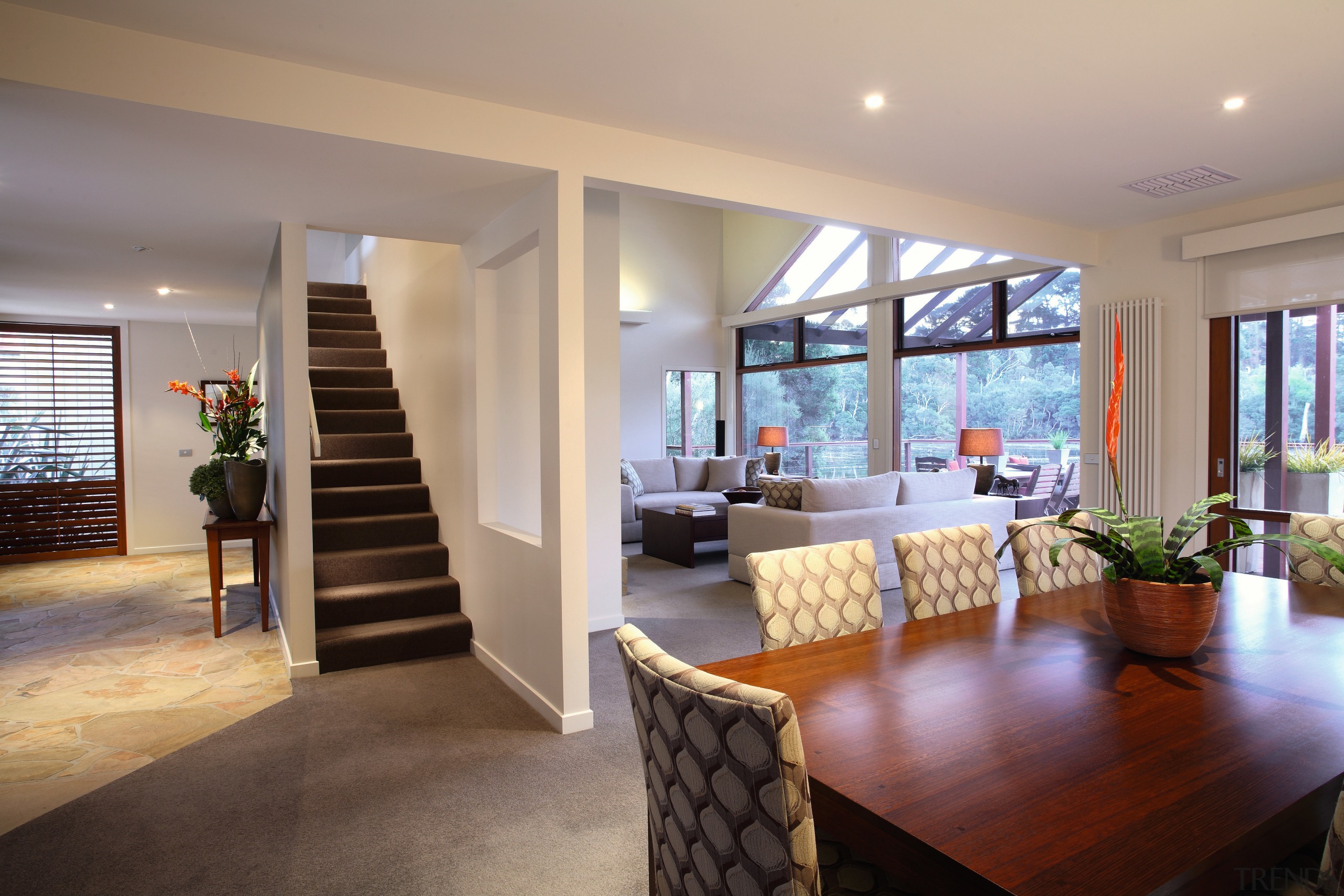 Long butt-jointed glazed windows frame views across the ceiling, home, interior design, living room, property, real estate, room, window, gray