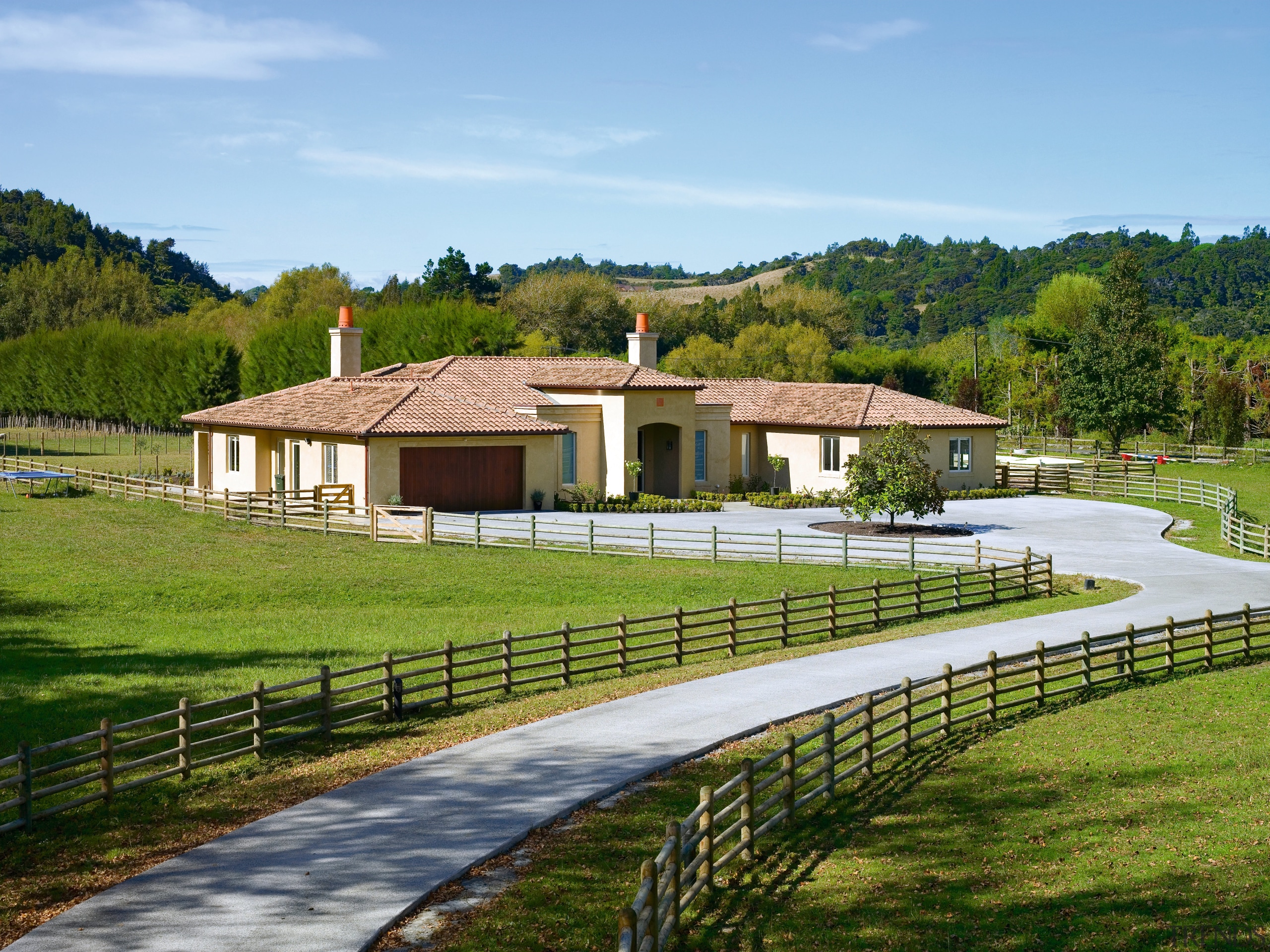 View of masonry country home with clay roof cottage, estate, facade, farm, farmhouse, grass, home, house, land lot, landscape, pasture, property, real estate, residential area, rural area, sky, villa, brown, teal