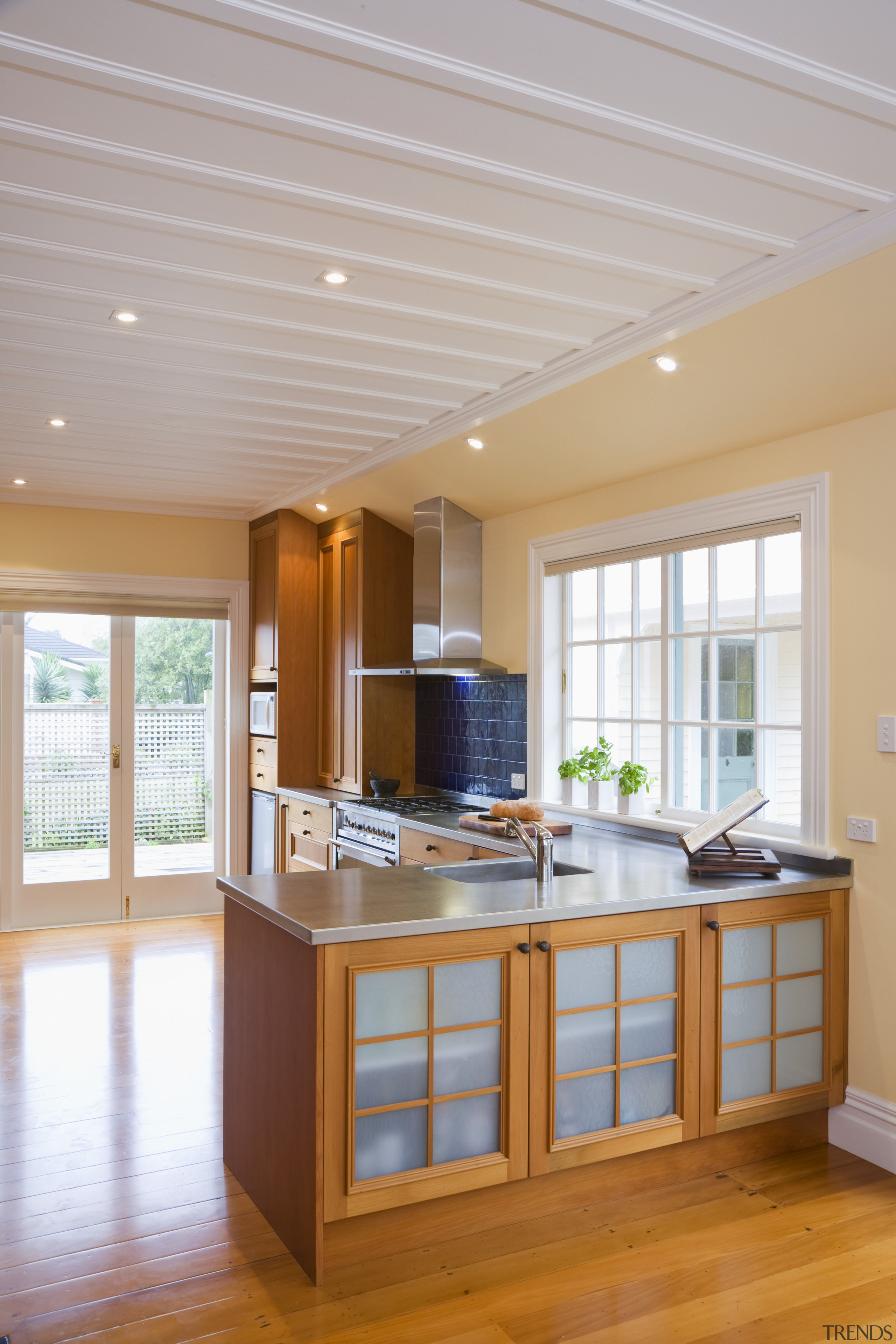 view of a renovated kitchen where Swamp kauri ceiling, countertop, daylighting, floor, flooring, hardwood, interior design, kitchen, real estate, room, window, wood flooring, gray